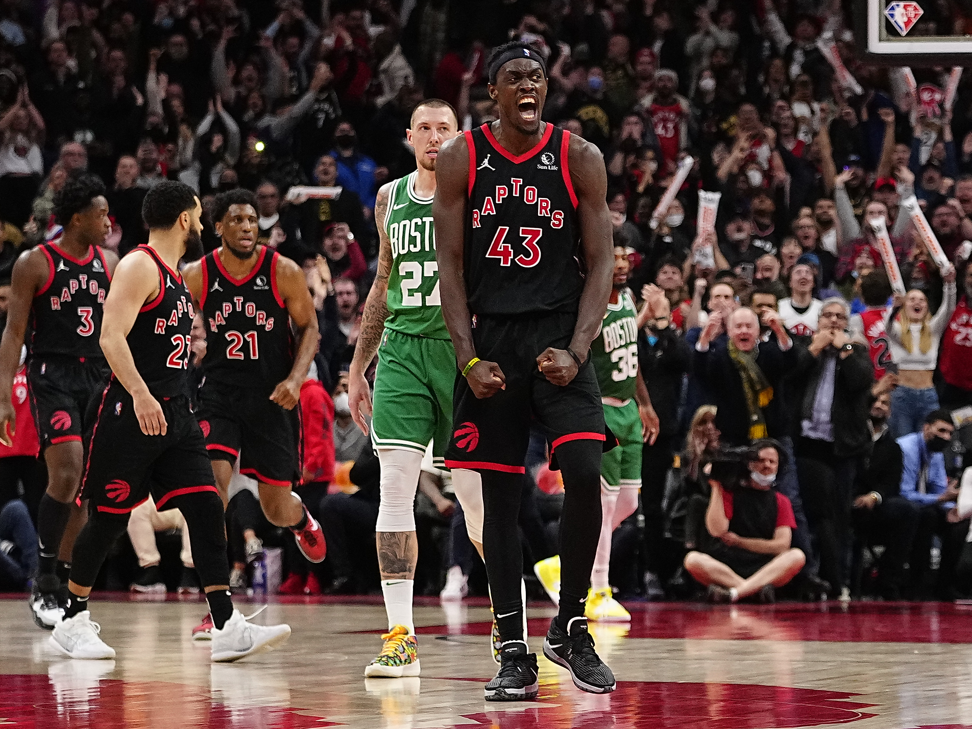 Mar 28, 2022; Toronto, Ontario, CAN; Toronto Raptors forward Pascal Siakam (43) reacts after a basket against the Boston Celtics during overtime at Scotiabank Arena. Mandatory Credit: John E. Sokolowski-USA TODAY Sports