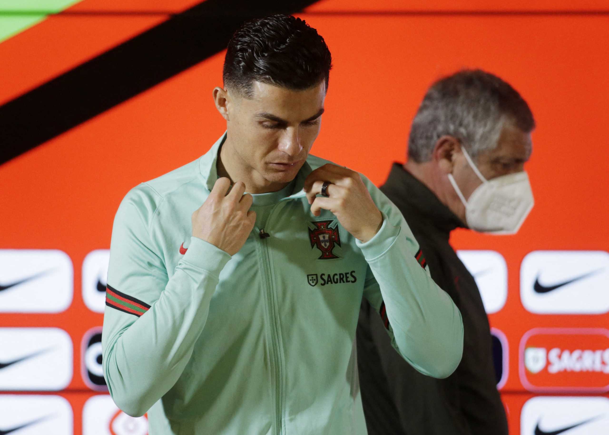 Soccer Football - FIFA World Cup - UEFA Qualifiers - Portugal Press Conference - Estadio do Dragao, Porto, Portugal - March 28, 2022 Portugal coach Fernando Santos and Cristiano Ronaldo during the press conference REUTERS