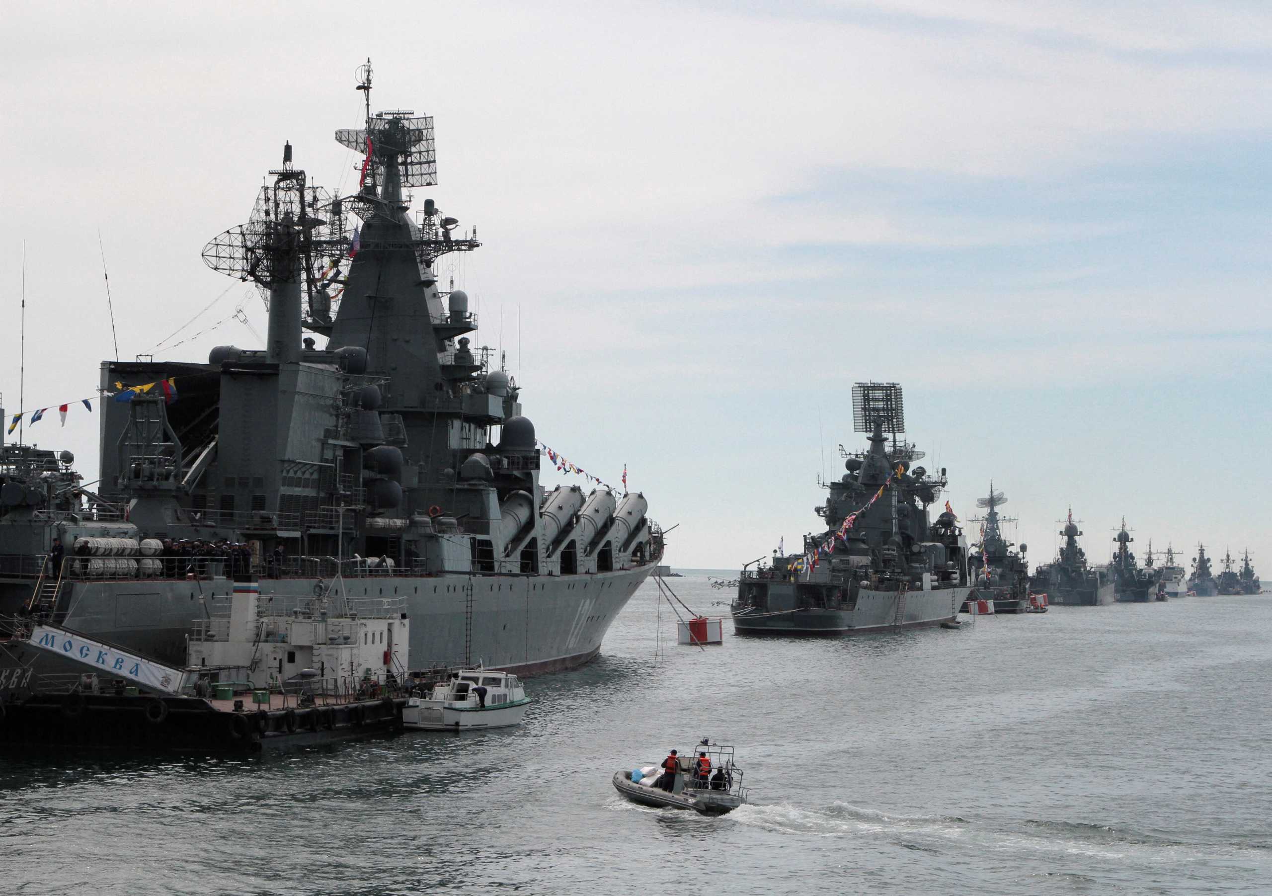 FILE PHOTO: Russian Navy vessels are anchored in a bay of the Black Sea port of Sevastopol in Crimea May 8, 2014.   REUTERS