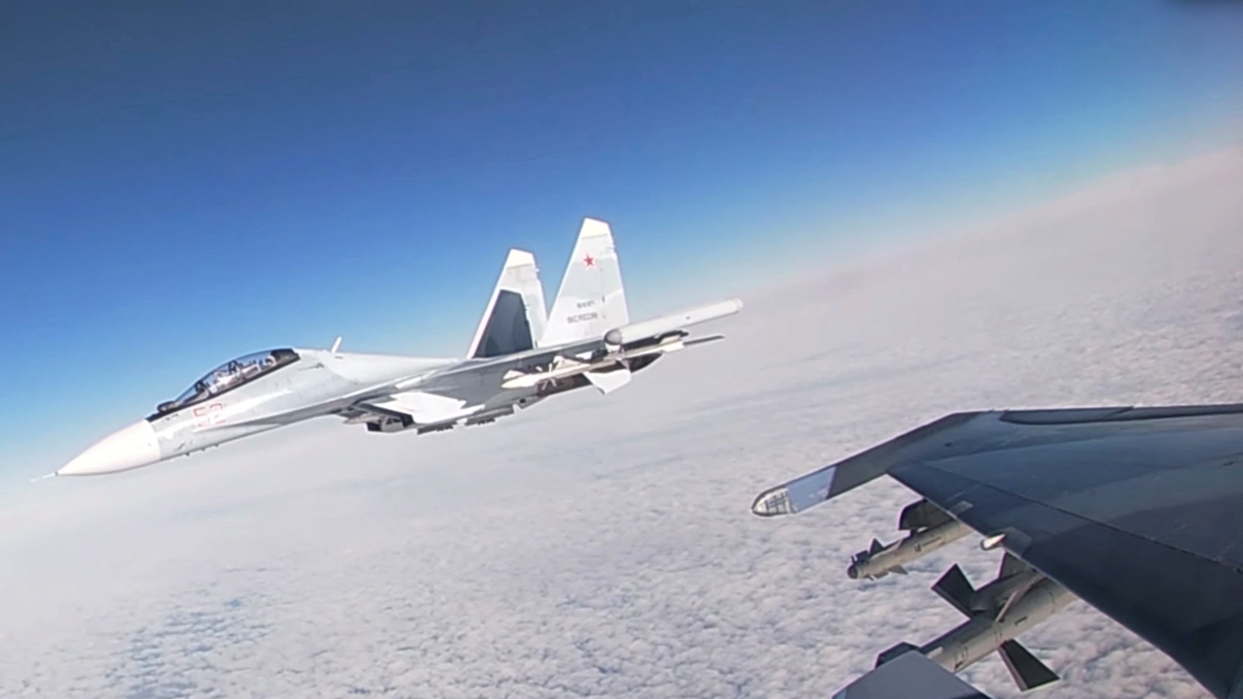 A Russian Su-30SM jet fighter flies during joint military exercises with Belarusian Air Forces in Belarusian air space, in this still image taken from a handout video released February 14, 2022. Russian Defence Ministry