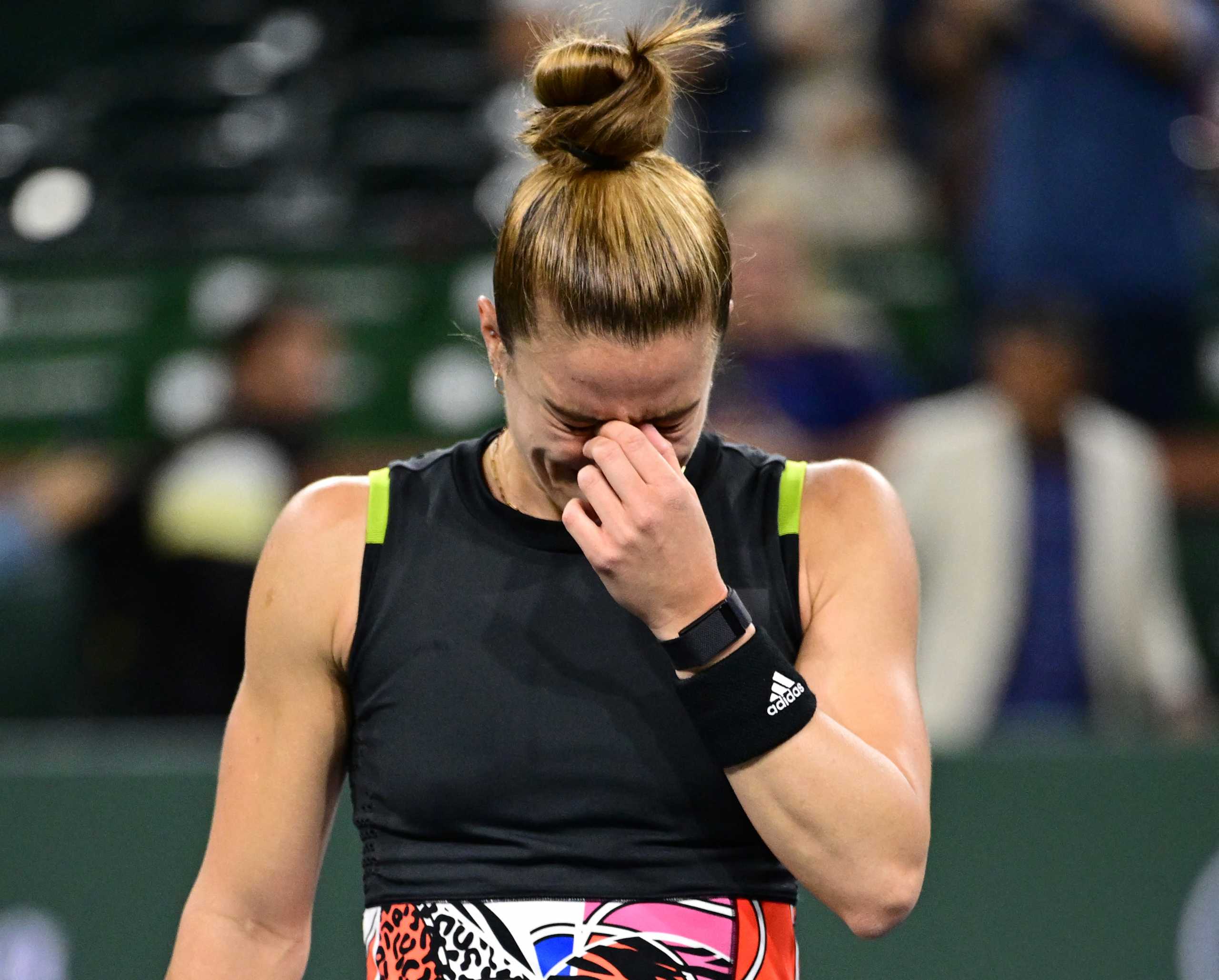 Mar 18, 2022; Indian Wells, CA, USA; Maria Sakkari (GRE) is overcome with emotion after defeating Paula Badosa (ESP) in her semifinal match during the BNP Paribas Open at the Indian Wells Tennis Garden. Mandatory Credit: Jayne Kamin-Oncea-USA TODAY Sports