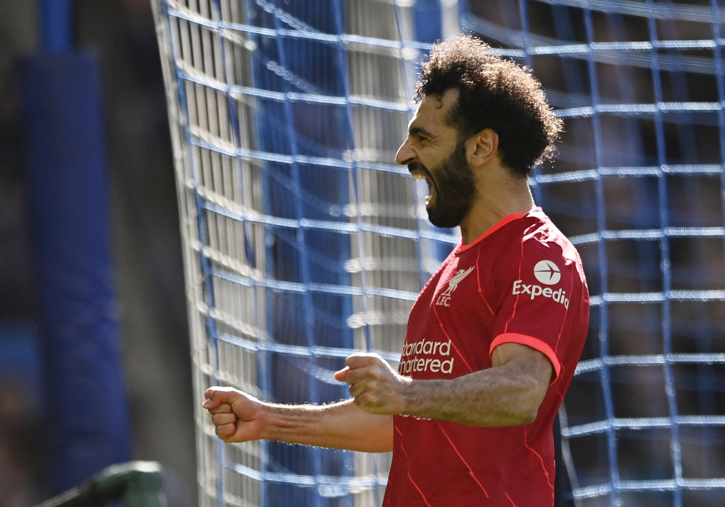 Soccer Football - Premier League - Brighton & Hove Albion v Liverpool - The American Express Community Stadium, Brighton, Britain - March 12, 2022 Liverpool's Mohamed Salah celebrates scoring their second goal REUTERS