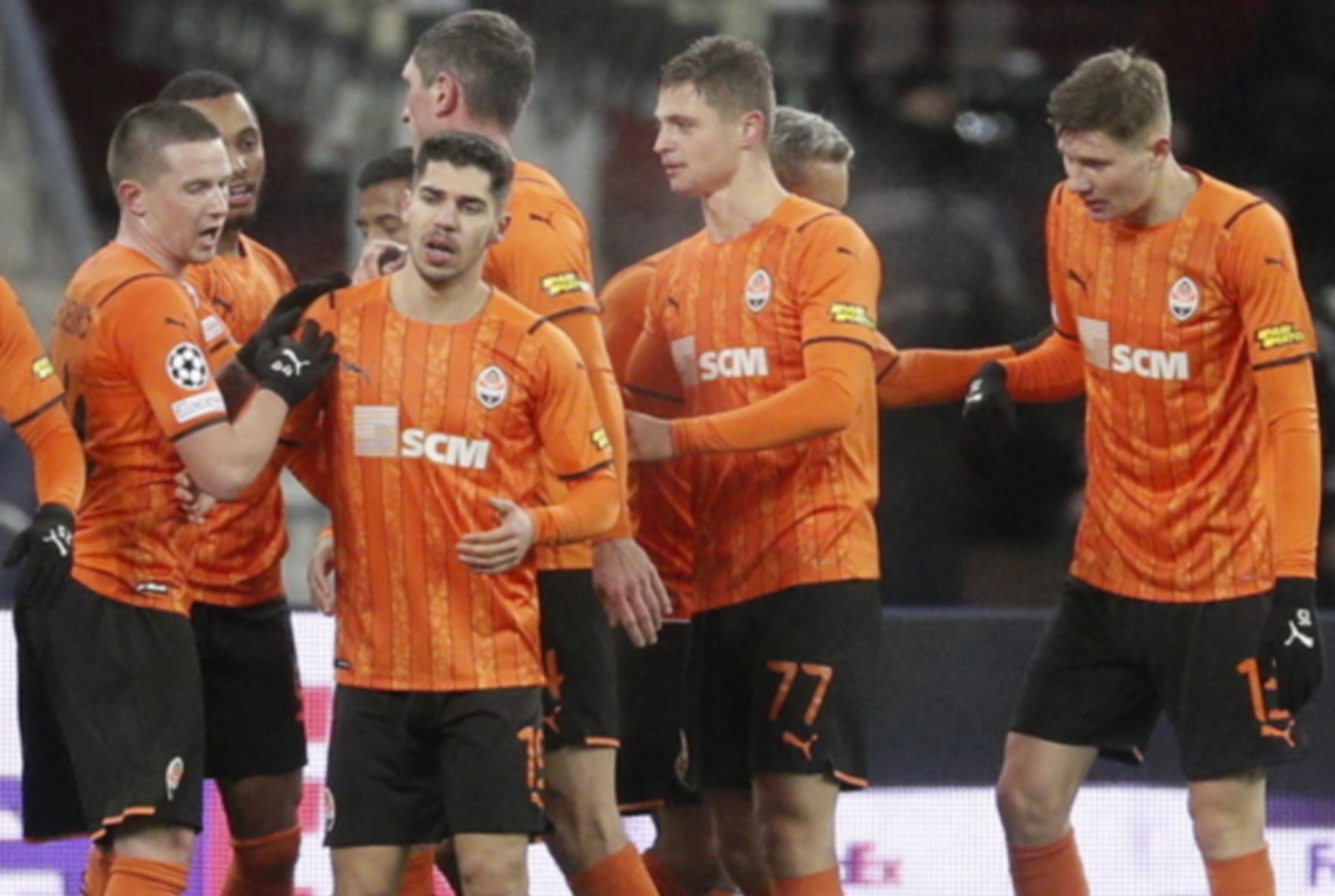 epa09628035 Players of Donetsk celebrate after scoring the 1-0 lead during the UEFA Champions League group D soccer match between Shakhtar Donetsk and Sheriff Tiraspol in Kiev, Ukraine, 07 December 2021.  EPA