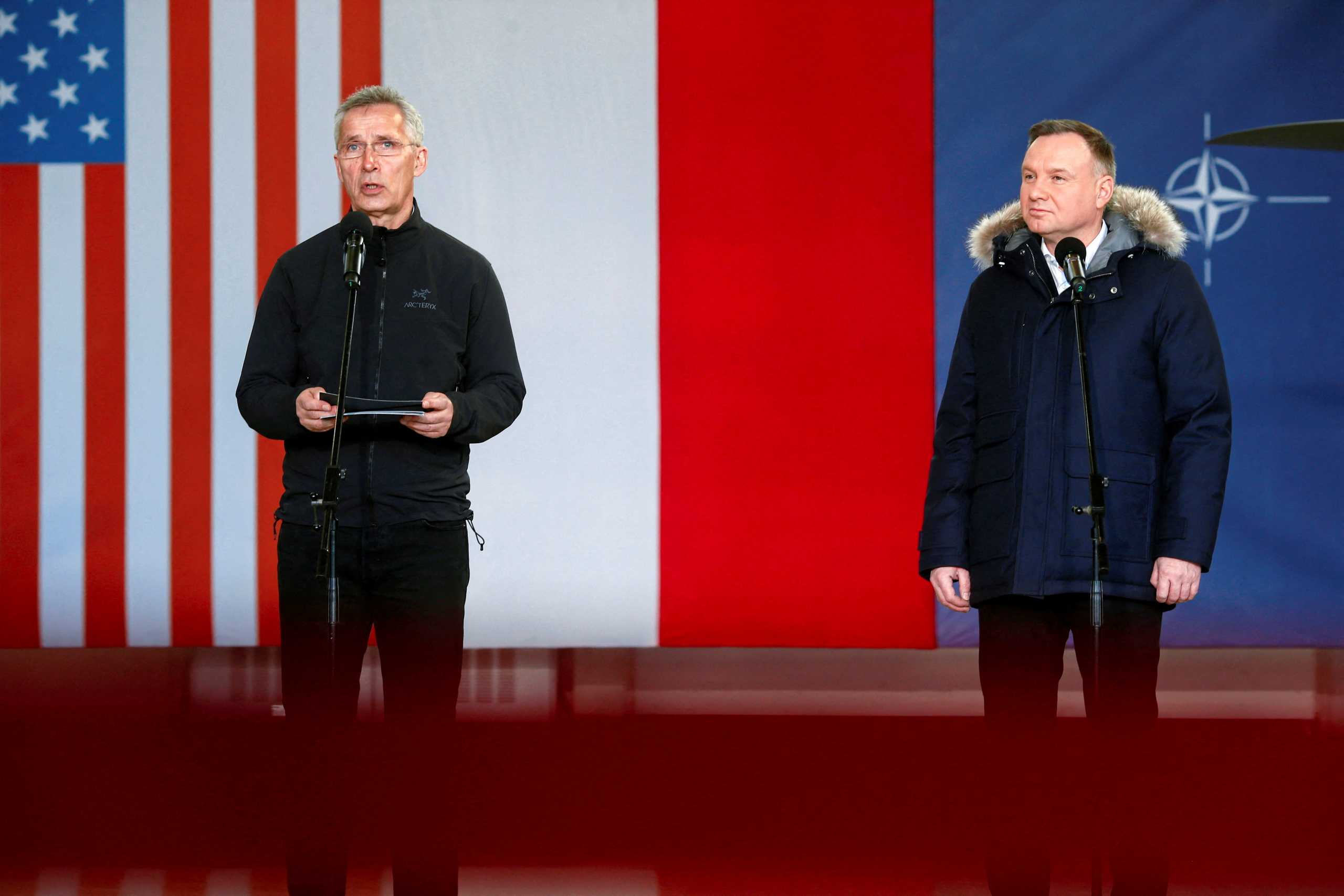 NATO Secretary-General Jens Stoltenberg and Polish President Andrzej Duda hold a news conference at Lask Air Base, Poland March 1, 2022. Marcin Stepien