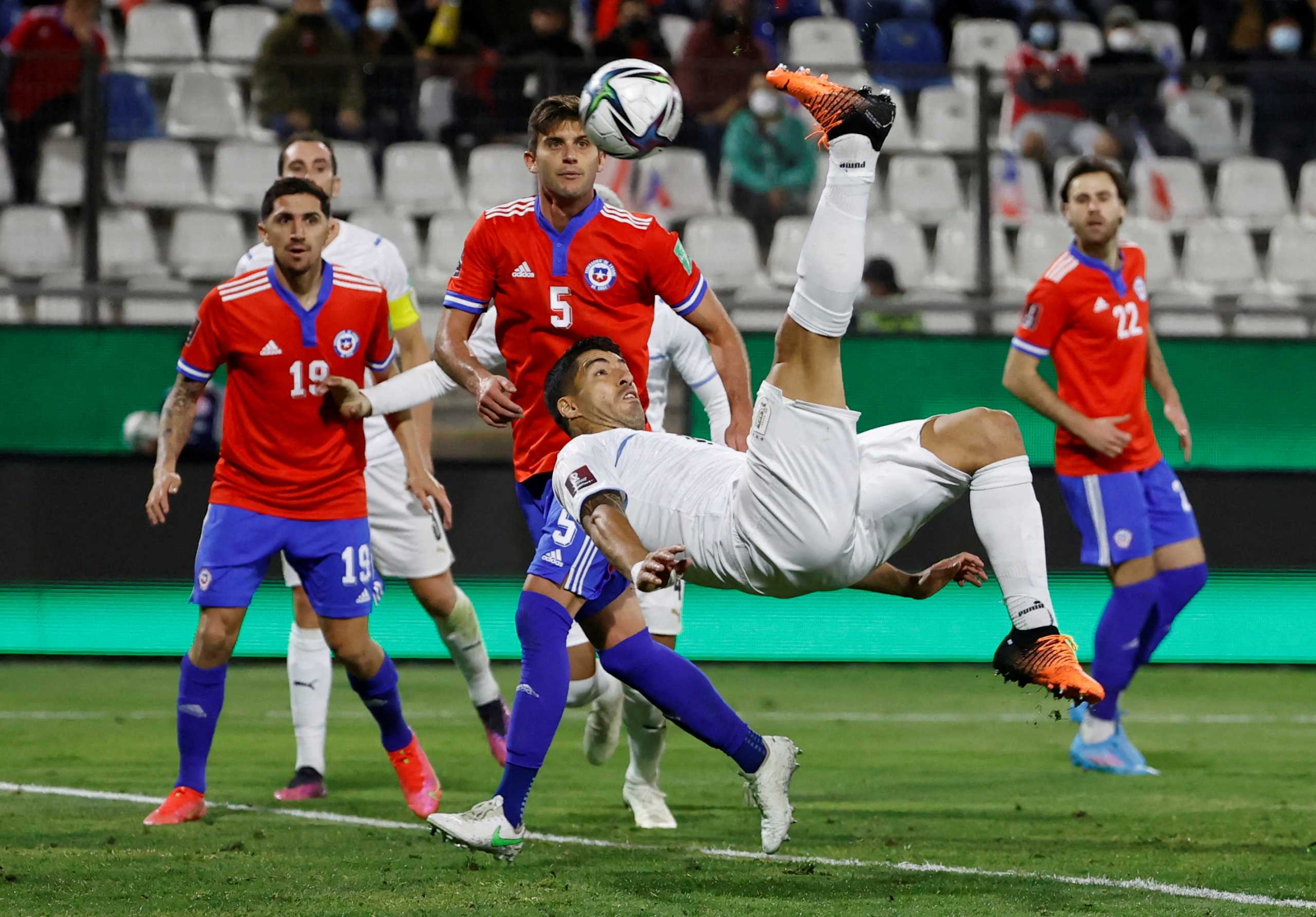 Soccer Football - World Cup - South American Qualifiers - Chile v Uruguay - Estadio San Carlos de Apoquindo, Santiago, Chile - March 29, 2022 Uruguay's Luis Suarez scores their first goal Pool via REUTERS