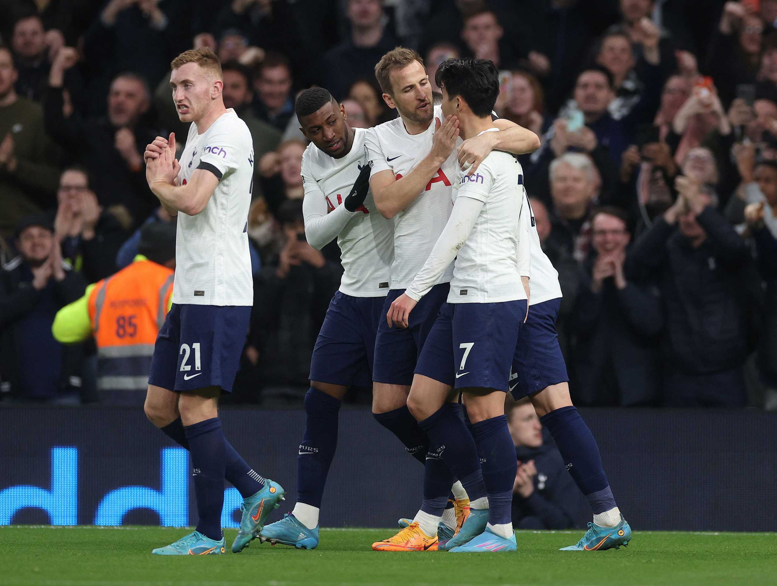 Soccer Football - Premier League - Tottenham Hotspur v West Ham United - Tottenham Hotspur Stadium, London, Britain - March 20, 2022 Tottenham Hotspur's Son Heung-min celebrates scoring their third goal with Harry Kane, Emerson Royal and Dejan Kulusevski Action Images via Reuters