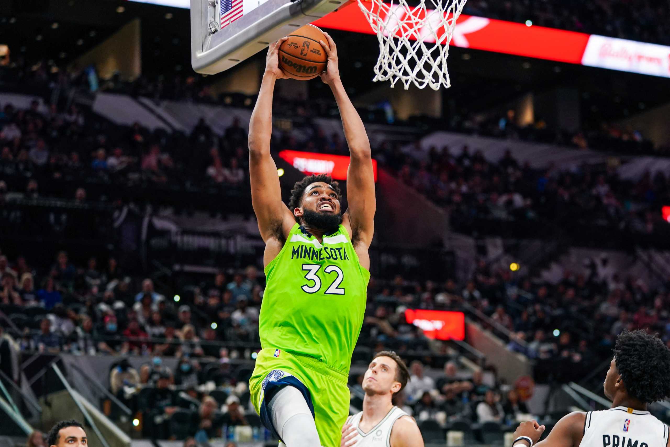 Mar 14, 2022; San Antonio, Texas, USA; Minnesota Timberwolves center Karl-Anthony Towns (32) shoots in the second half against the San Antonio Spurs at the AT&T Center. Mandatory Credit: Daniel Dunn-USA TODAY Sports