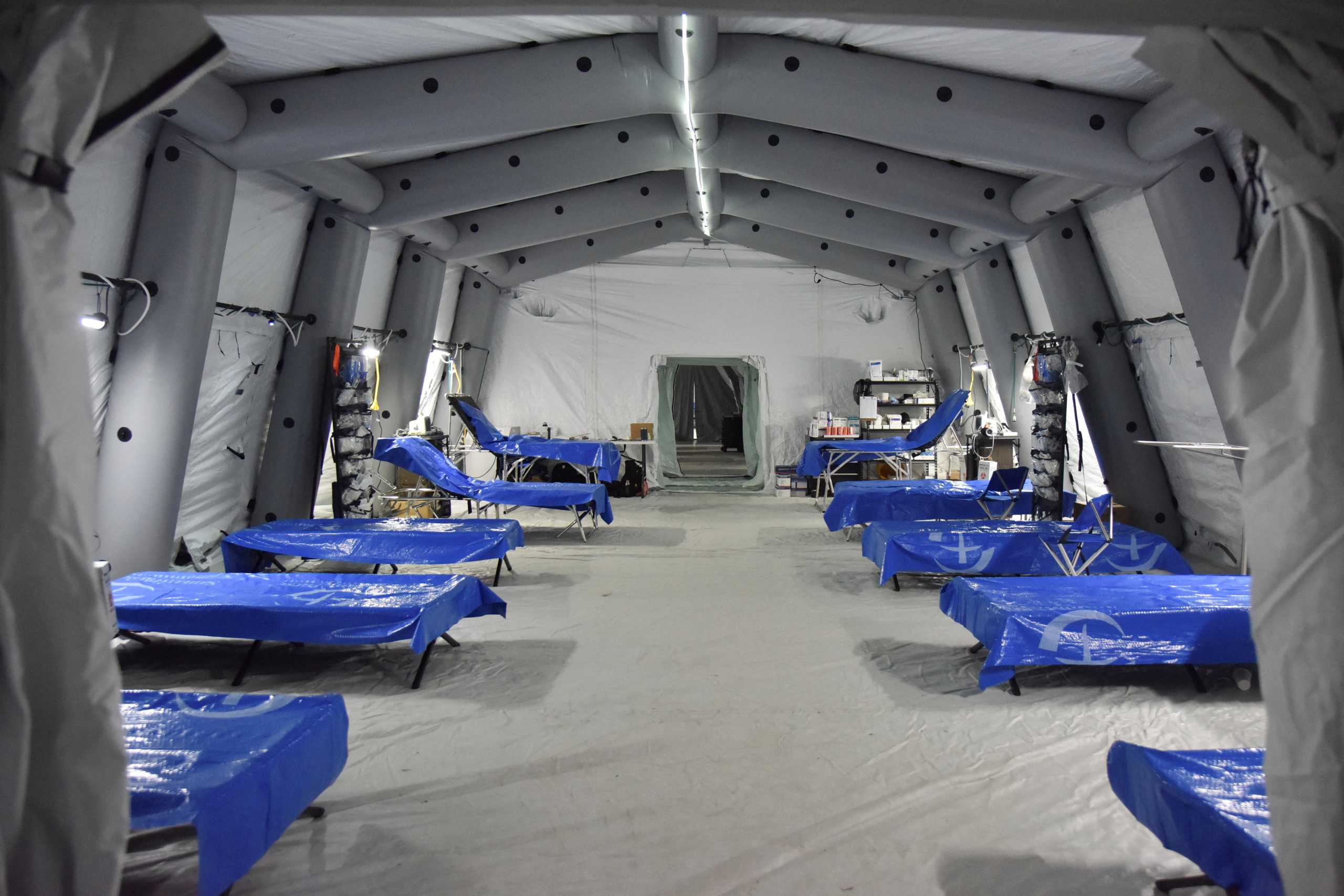 Empty beds are seen at a field hospital deployed by American doctors from the "Samaritan's Purse" organization in an underground parking lot of the King Cross Leopolis shopping mall, amid Russia's invasion of Ukraine, at the village of Sokilnyky, near Lviv, Ukraine, March 14, 2022. REUTERS