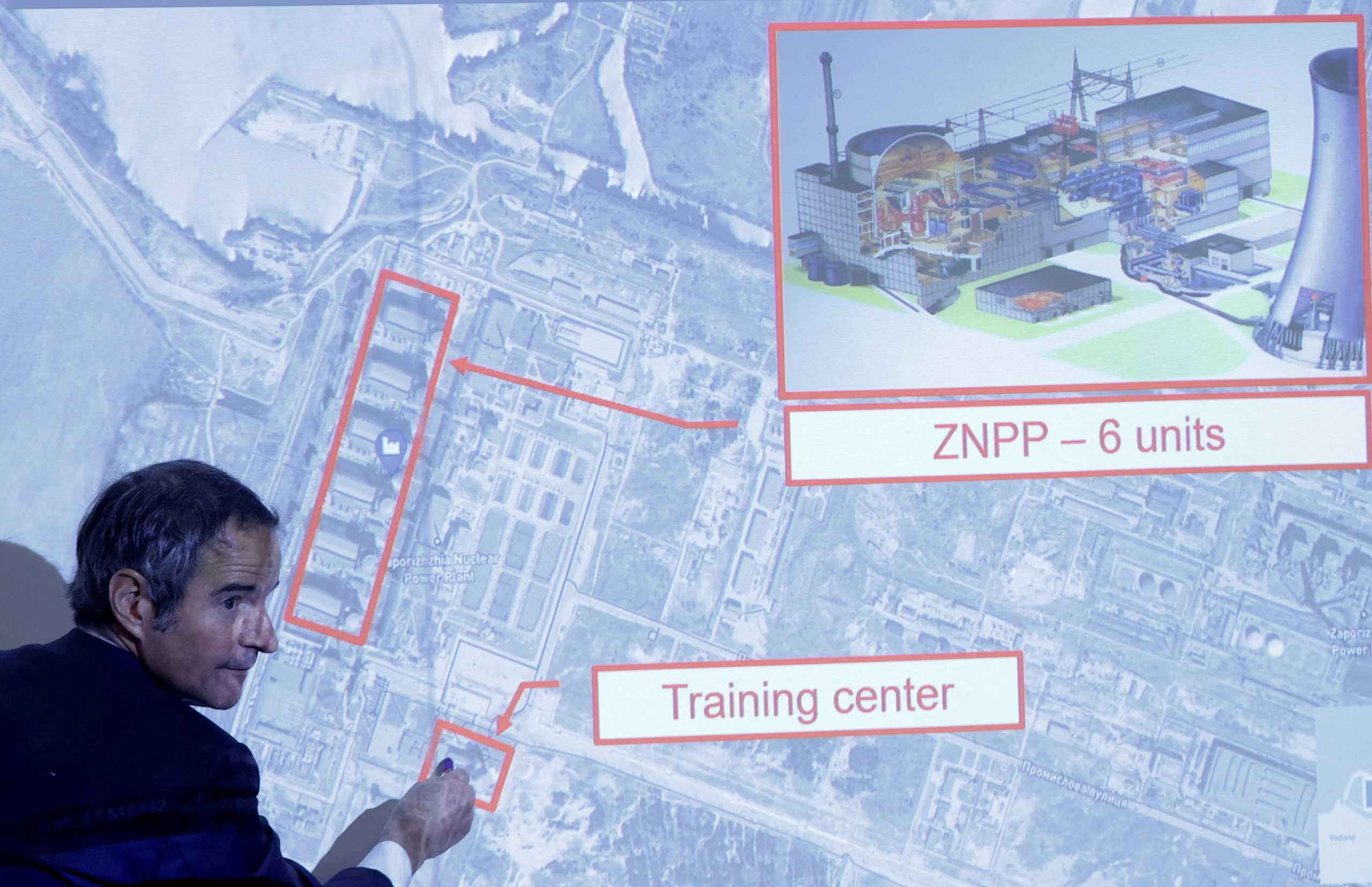 International Atomic Energy Agency (IAEA) Director General Rafael Grossi points on a map of a Ukrainian power plant during a news conference in Vienna, Austria March 4, 2022. REUTERS