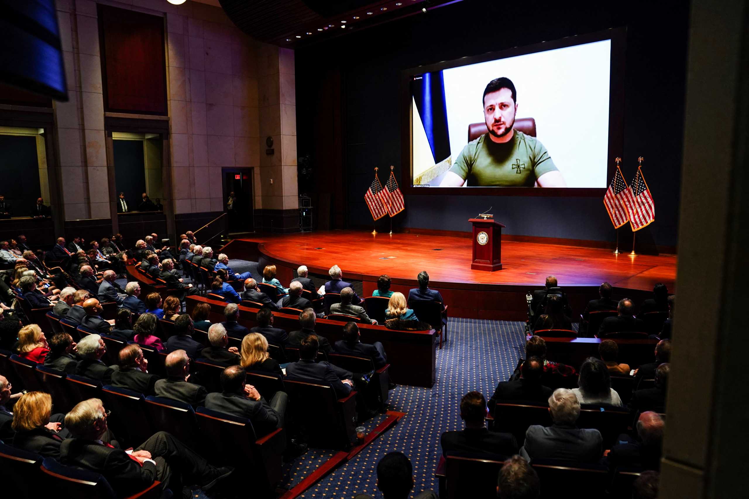 Ukraine’s President Volodymyr Zelenskiy delivers a video address to senators and members of the House of Representatives gathered in the Capitol Visitor Center Congressional Auditorium at the U.S. Capitol in Washington, U.S., March 16, 2022. REUTERS