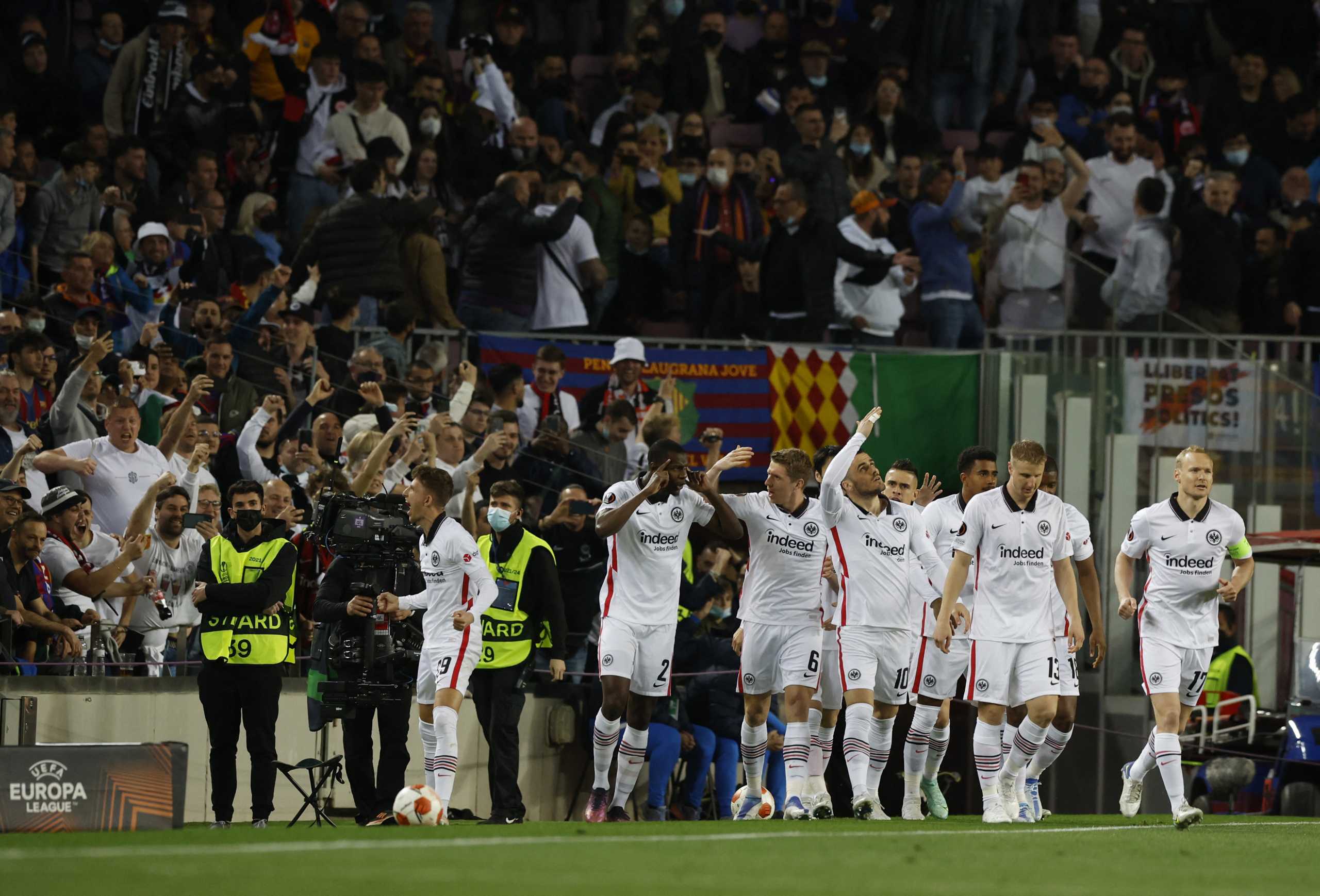 Soccer Football - Europa League - Quarter Final - Second Leg - FC Barcelona v Eintracht Frankfurt - Camp Nou, Barcelona, Spain - April 14, 2022 Eintracht Frankfurt's Filip Kostic celebrates scoring their first goal with teammates REUTERS