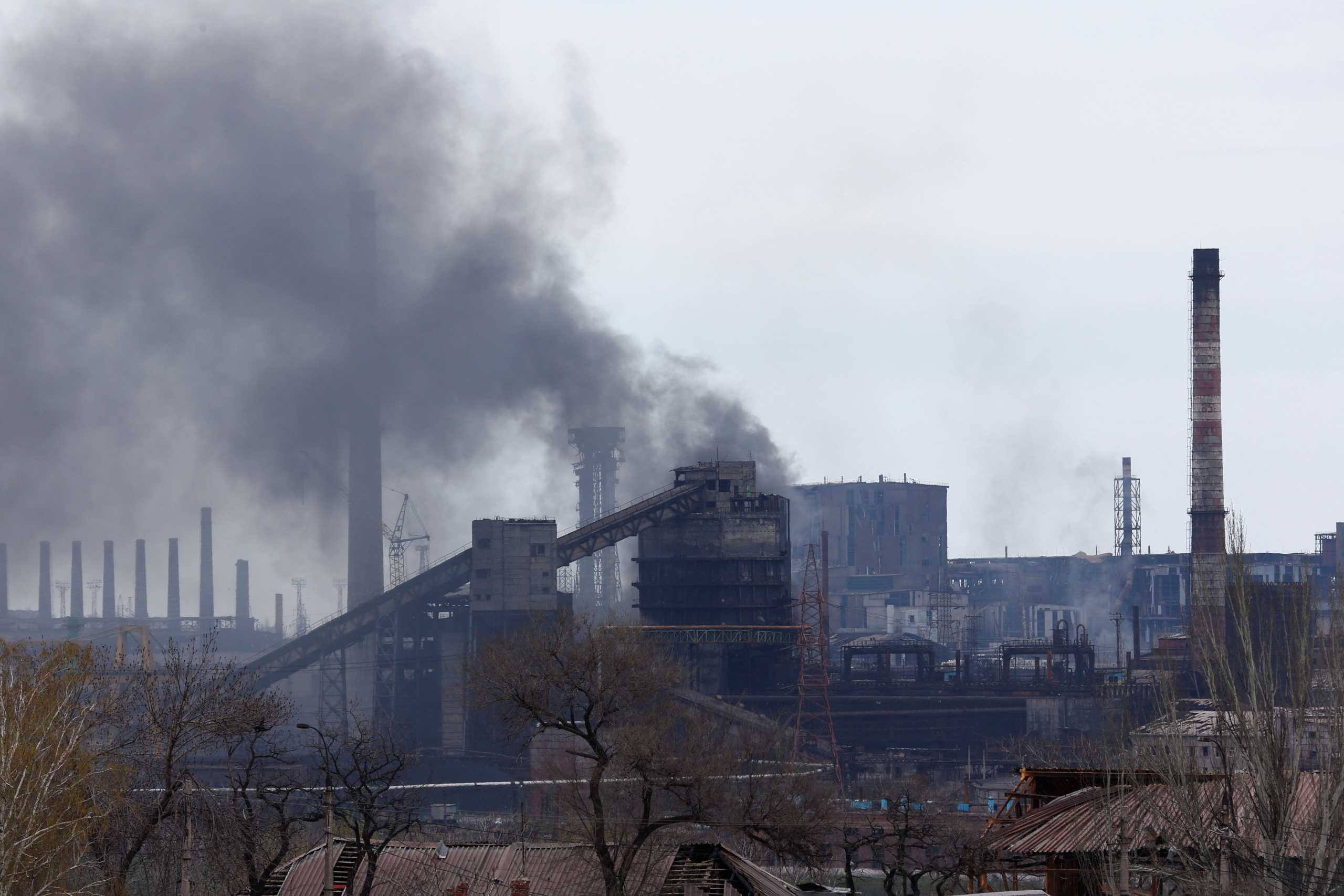 Smoke rises above a plant of Azovstal Iron and Steel Works during Ukraine-Russia conflict in the southern port city of Mariupol, Ukraine April 21, 2022. REUTERS