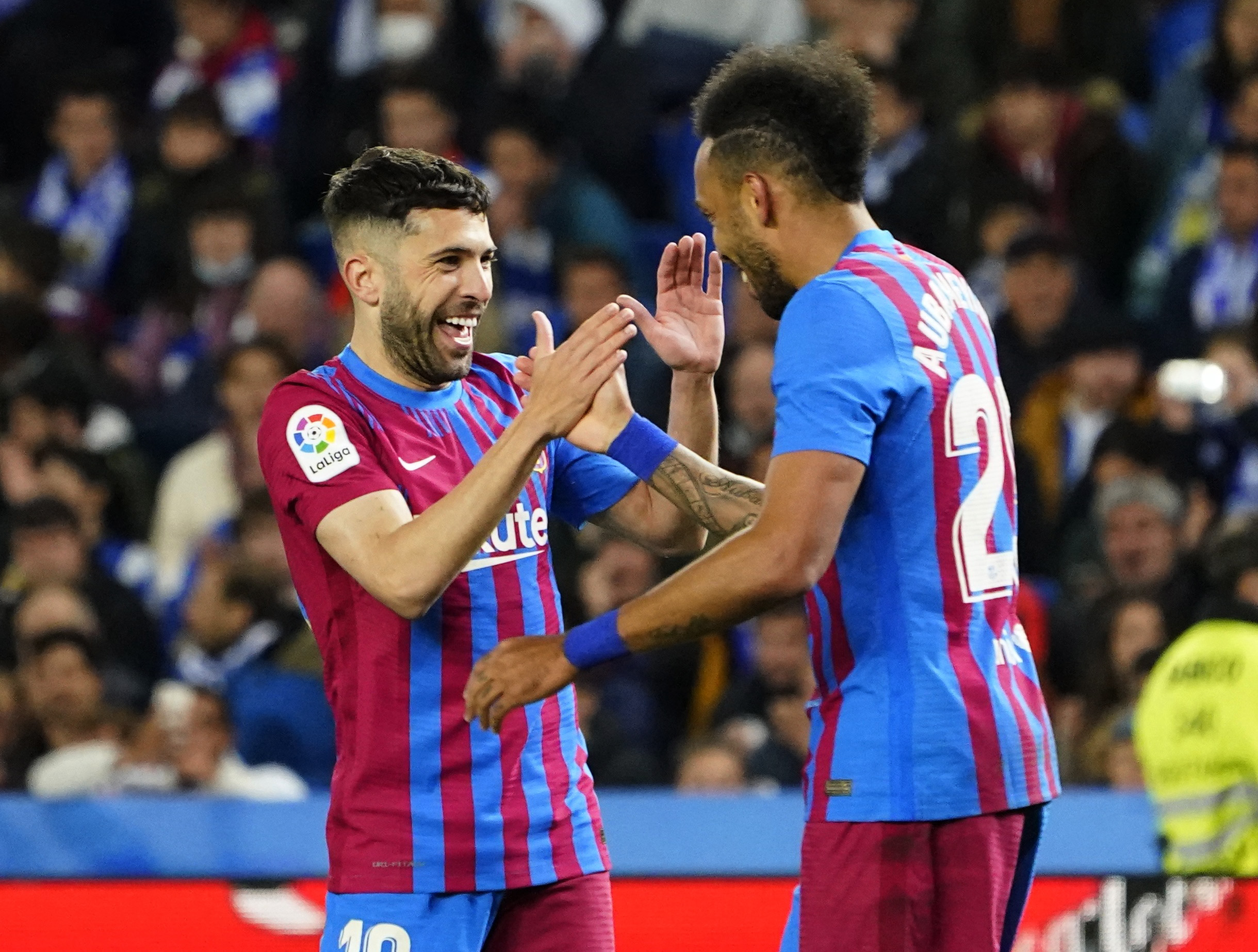Soccer Football - LaLiga - Real Sociedad v FC Barcelona - Reale Arena, San Sebastian, Spain - April 21, 2022 FC Barcelona's Pierre-Emerick Aubameyang celebrates scoring their first goal with Jordi Alba REUTERS