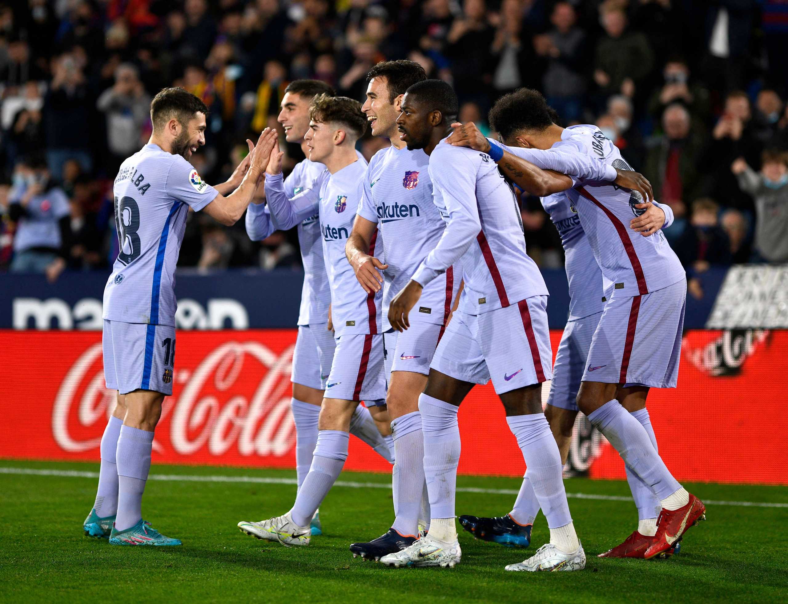 Soccer Football - LaLiga - Levante v FC Barcelona - Estadio Ciudad de Valencia, Valencia, Spain - April 10, 2022 FC Barcelona's Pedri celebrates scoring their second goal with teammates REUTERS