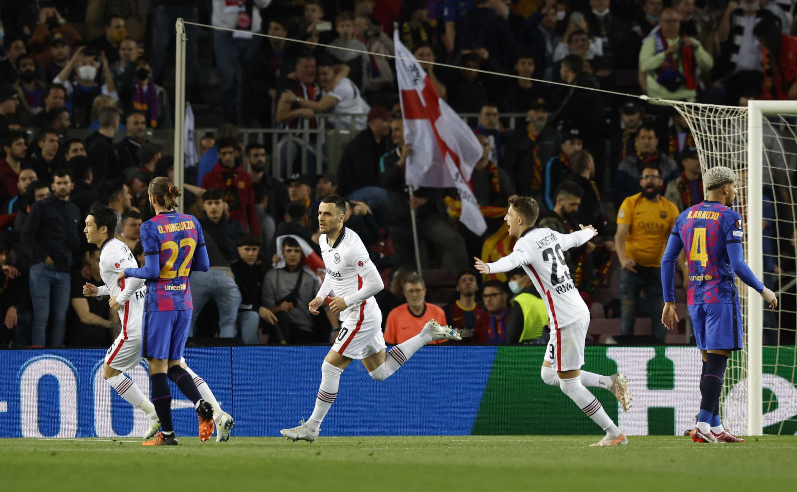 Soccer Football - Europa League - Quarter Final - Second Leg - FC Barcelona v Eintracht Frankfurt - Camp Nou, Barcelona, Spain - April 14, 2022 Eintracht Frankfurt's Filip Kostic celebrates scoring their first goal with teammates REUTERS
