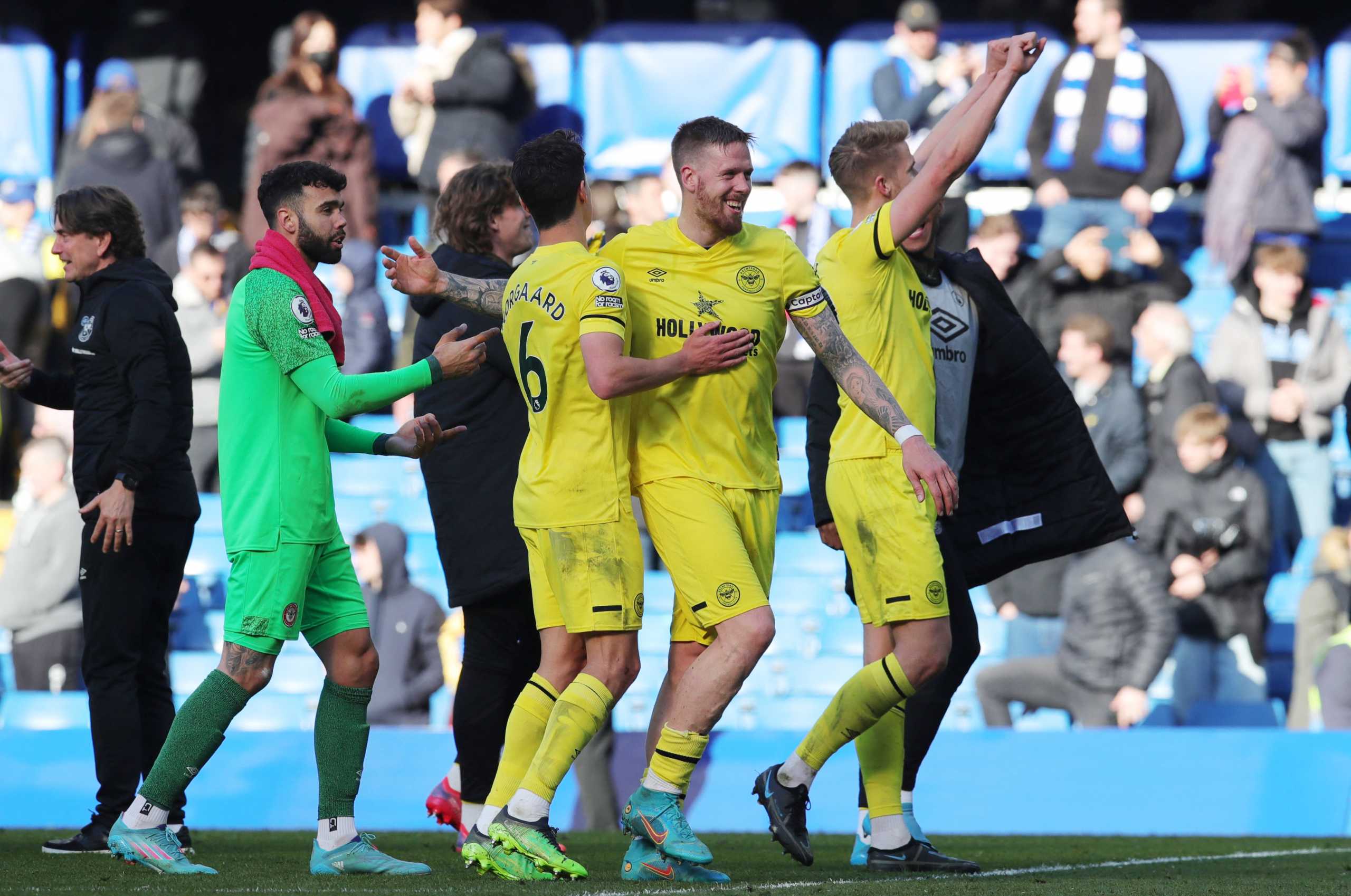Soccer Football - Premier League - Chelsea v Brentford - Stamford Bridge, London, Britain - April 2, 2022 Brentford's Pontus Jansson celebrates with Christian Norgaard and David Raya after the match REUTERS