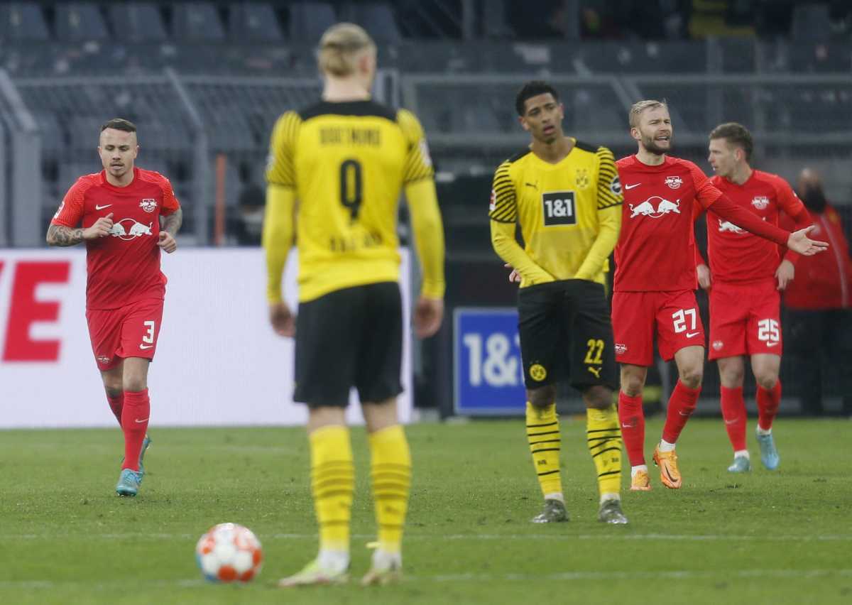Soccer Football - Bundesliga - Borussia Dortmund v RB Leipzig - Signal Iduna Park, Dortmund, Germany - April 2, 2022 Borussia Dortmund's Jude Bellingham looks dejected after RB Leipzig's Christopher Nkunku scored their third goal REUTERS