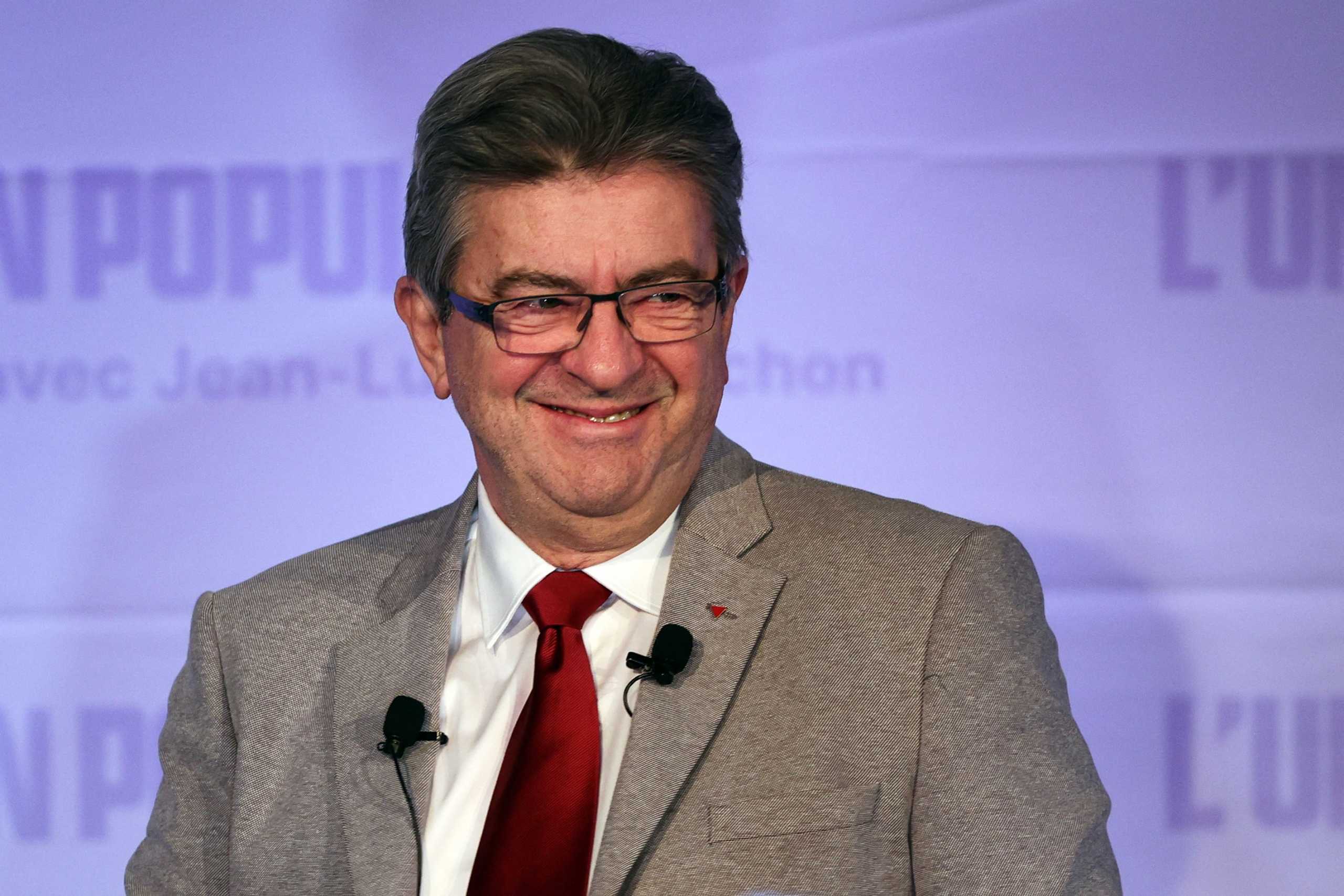 Jean-Luc Melenchon, leader of the far-left opposition party La France Insoumise (France Unbowed - LFI), and L'Union populaire (popular union) candidate for the 2022 French presidential election, reacts on stage after partial results in the first round of the 2022 French presidential election, in Paris, France, April 10, 2022. REUTERS