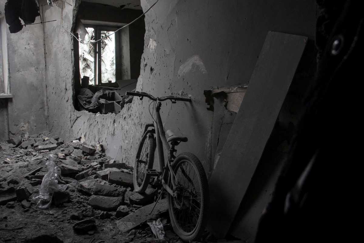 A bicycle is seen inside a heavily damaged room, following Russian shelling, amid Russia's invasion of Ukraine, in Kharkiv, Ukraine, April 20, 2022. REUTERS