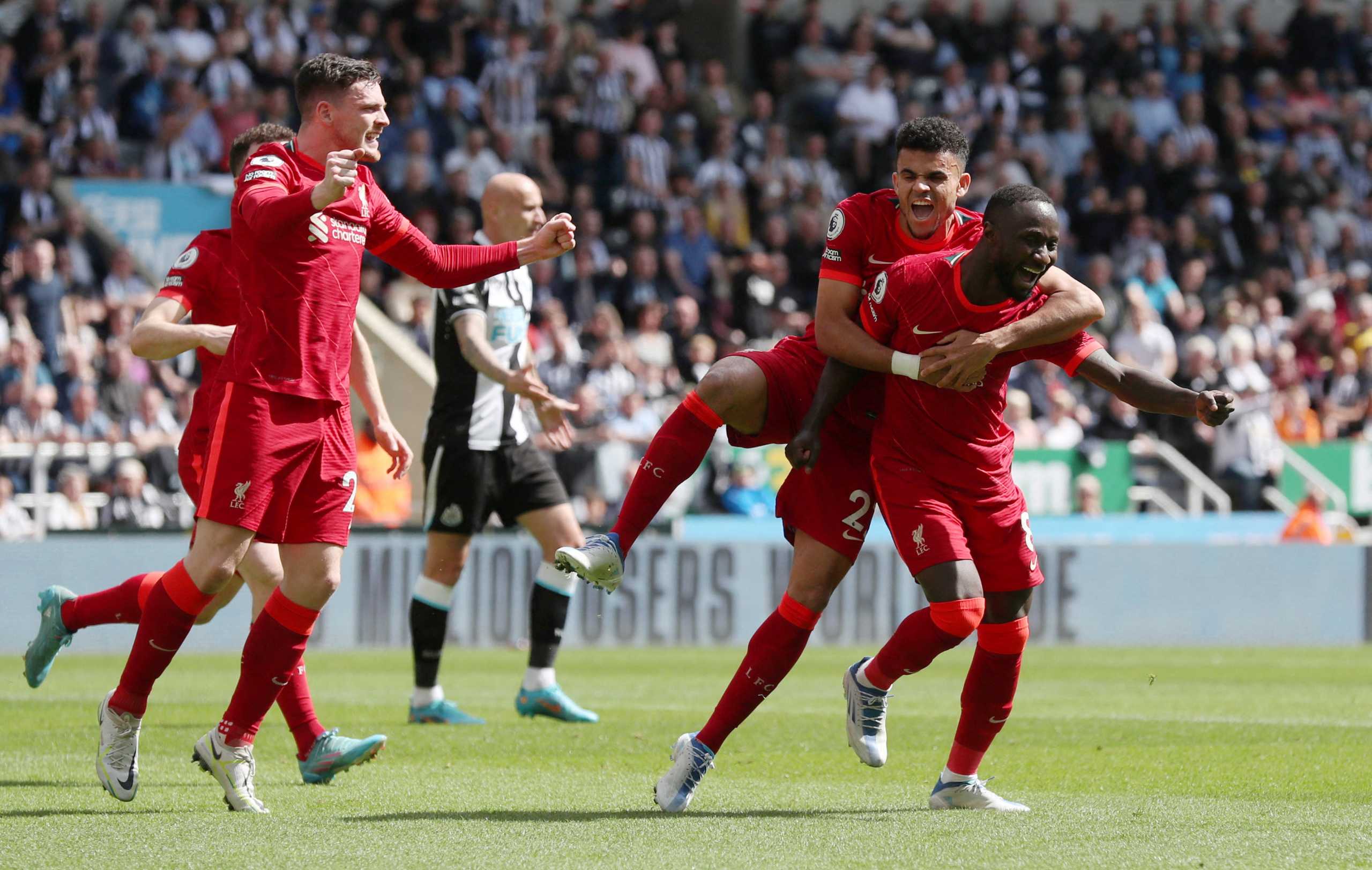 Soccer Football - Premier League - Newcastle United v Liverpool - St James' Park, Newcastle, Britain - April 30, 2022 Liverpool's Naby Keita celebrates scoring their first goal with Luis Diaz and Andrew Robertson REUTERS