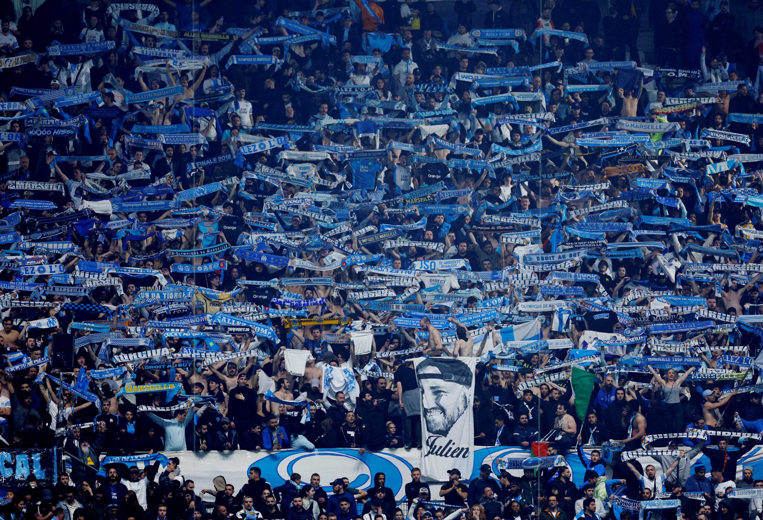 Soccer Football - Europa Conference League - Quarter Final - First Leg - Olympique Marseille v PAOK - Orange Velodrome, Marseille, France - April 7, 2022 Olympique Marseille fans hold banners inside the stadium REUTERS