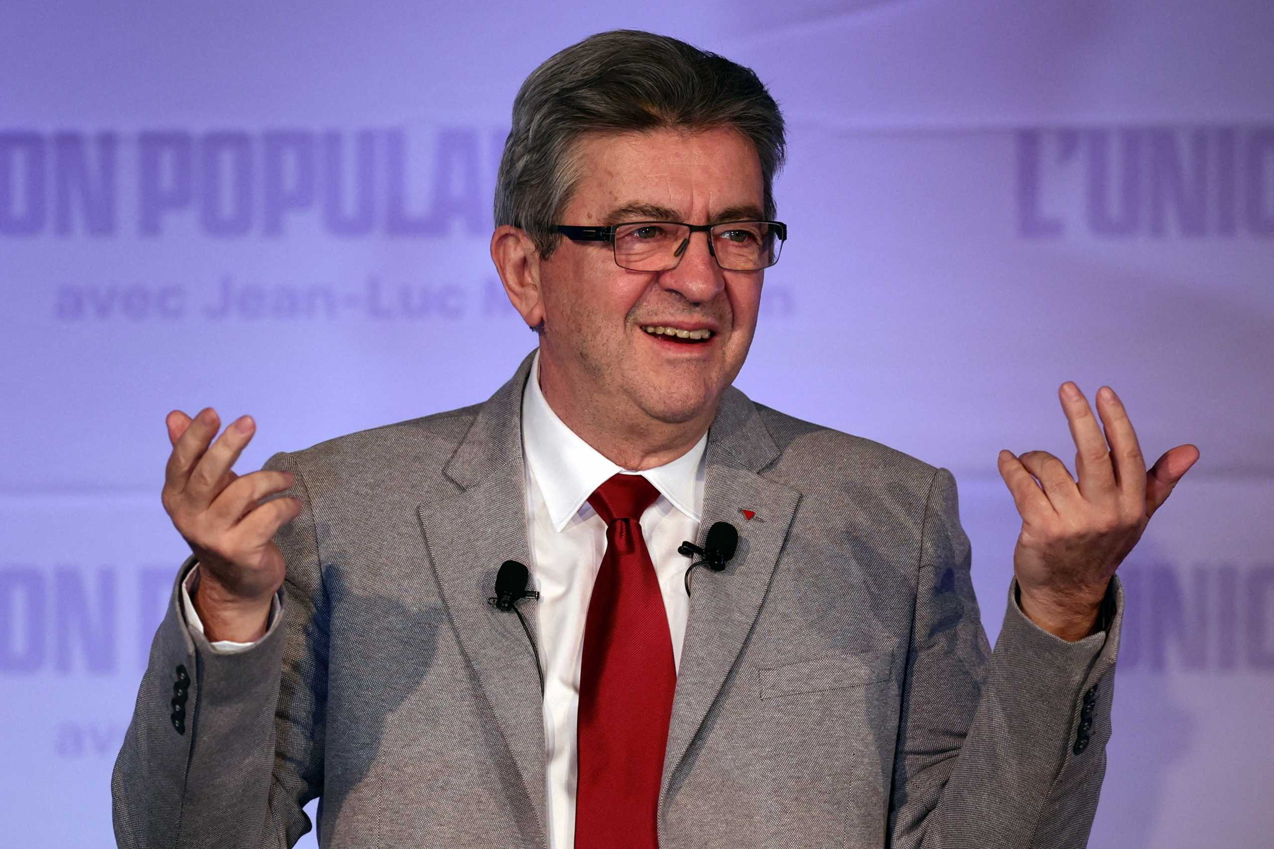 Jean-Luc Melenchon, leader of the far-left opposition party La France Insoumise (France Unbowed - LFI), and L'Union populaire (popular union) candidate for the 2022 French presidential election, gestures on stage after partial results in the first round of the 2022 French presidential election, in Paris, France, April 10, 2022. REUTERS