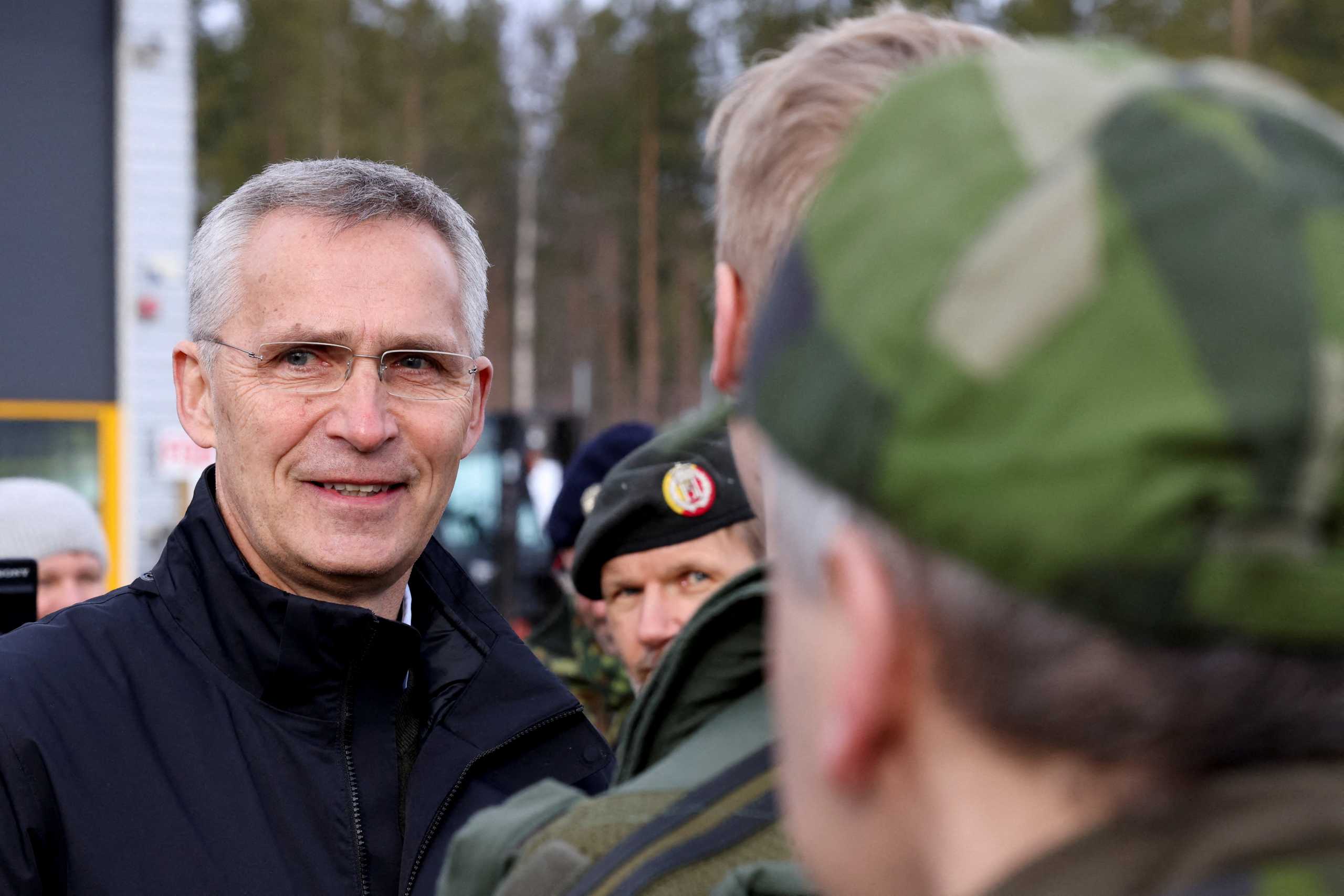NATO Secretary General Jens Stoltenberg meets the troops as part of a military exercise called "Cold Response 2022", gathering around 30,000 troops from NATO member countries plus Finland and Sweden, amid Russia's invasion of Ukraine, at a base in Bardufoss in the Arctic Circle, Norway, March 25, 2022. REUTERS