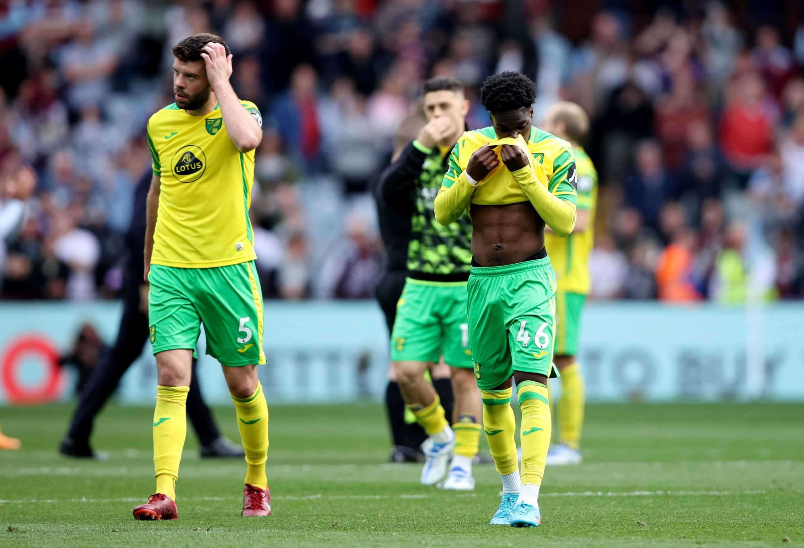Soccer Football - Premier League - Aston Villa v Norwich City - Villa Park, Birmingham, Britain - April 30, 2022 Norwich City's Grant Hanley and Jonathan Rowe look dejected after being relegated from the Premier League Action Images via Reuters