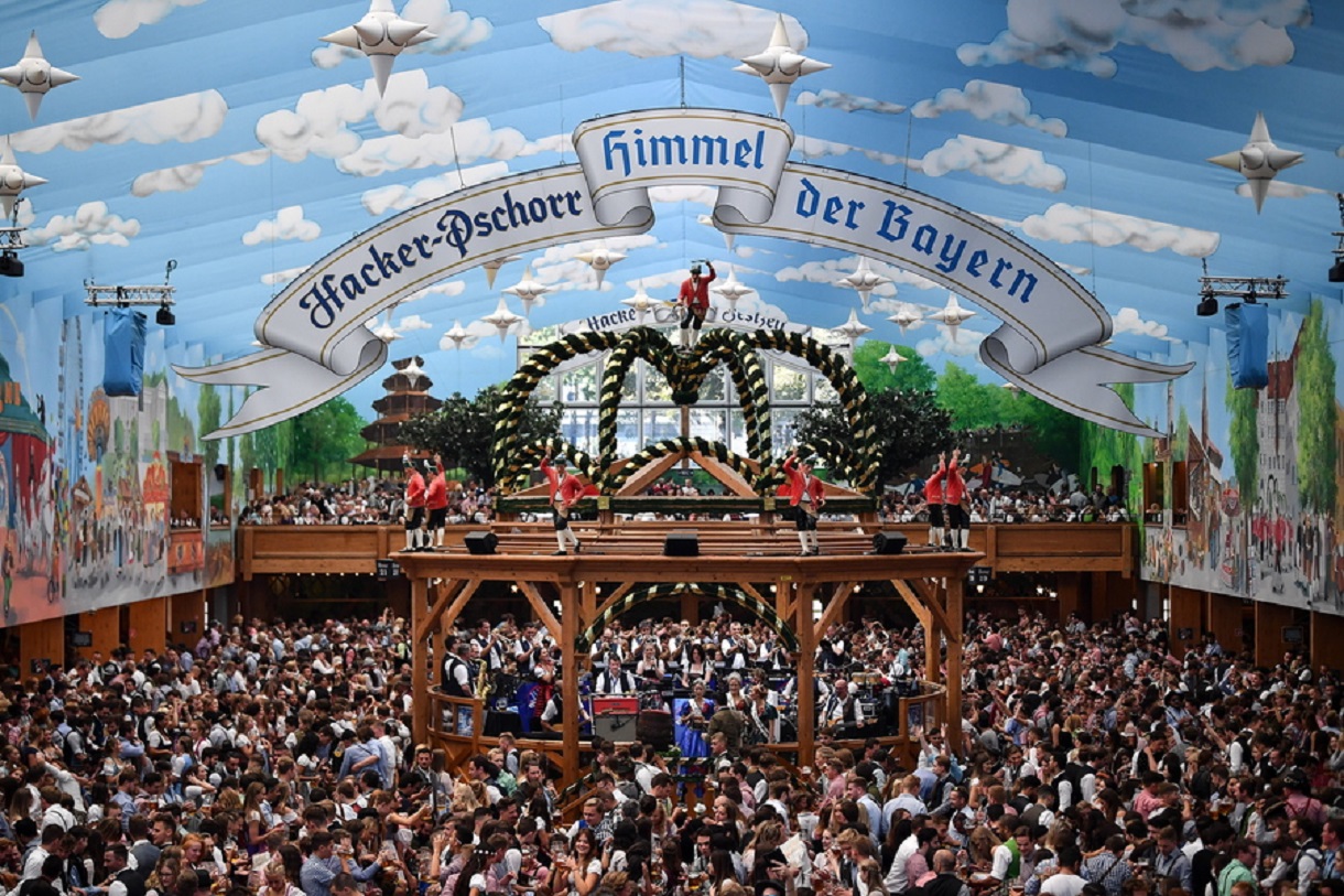 epa09175934 (FILE) - Visitors celebrate at the Hacker Pschorr 'Himmel der Bayern' (Bavarians Heaven) tent during the opening day of the 186th Oktoberfest beer festival on the Theresienwiese in Munich, Germany, 21 September 2019 (reissued 03 May 2021). The 2021 Oktoberfest shall be cancelled due to the worldwide coronavirus pandemic, Bavarian Premier Soeder and Munich Lord Mayor Reiter agreed on 03 May 2021.  EPA