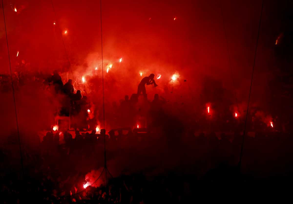Soccer Football - Europa Conference League - Quarter Final - First Leg - Olympique Marseille v PAOK - Orange Velodrome, Marseille, France - April 7, 2022 Fans with flares are pictured inside the stadium before the match REUTERS