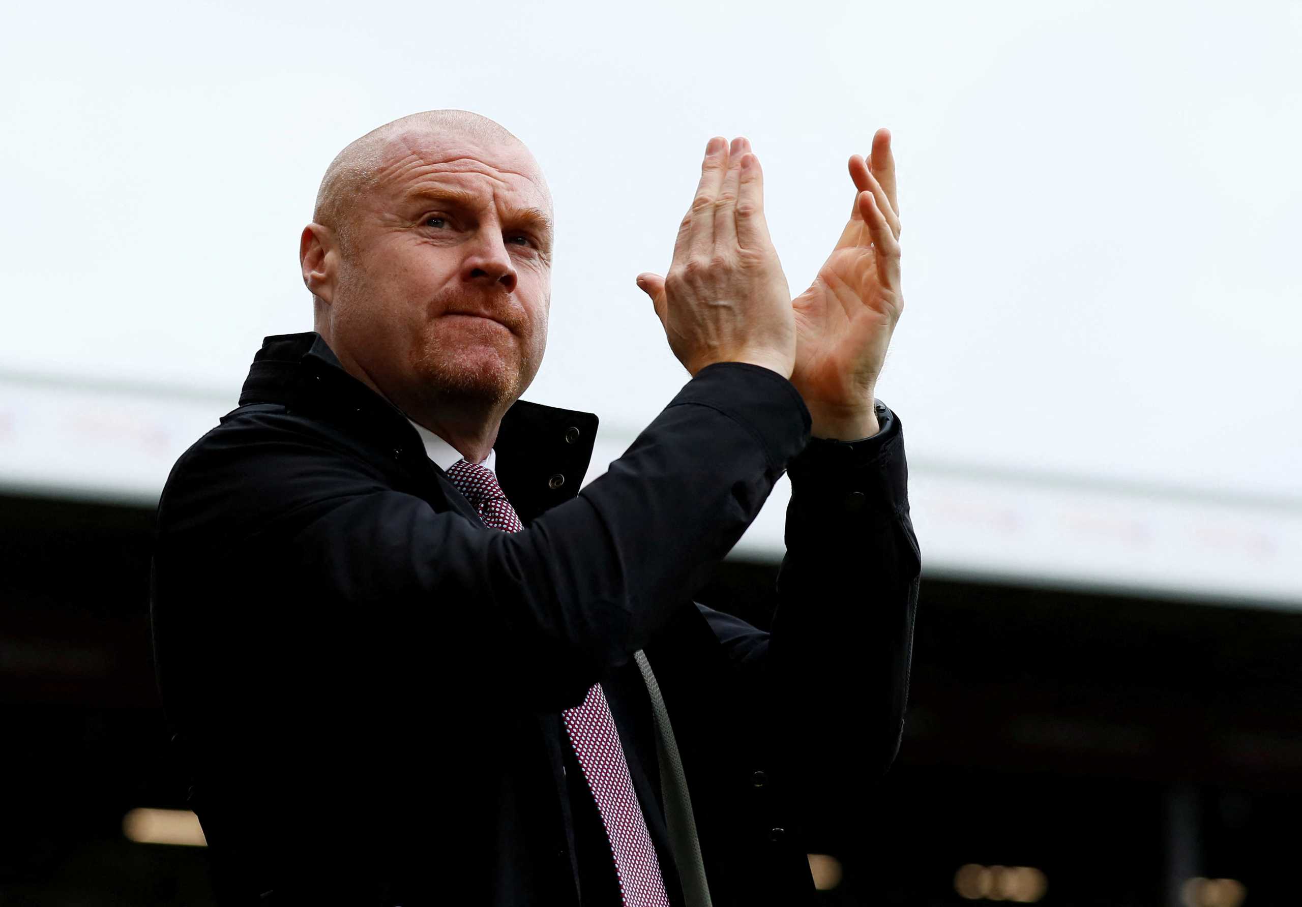 FILE PHOTO: Soccer Football - Premier League - Burnley v Arsenal - Turf Moor, Burnley, Britain - February 2, 2020  Burnley manager Sean Dyche applauds the fans before the match   Action Images via Reuters