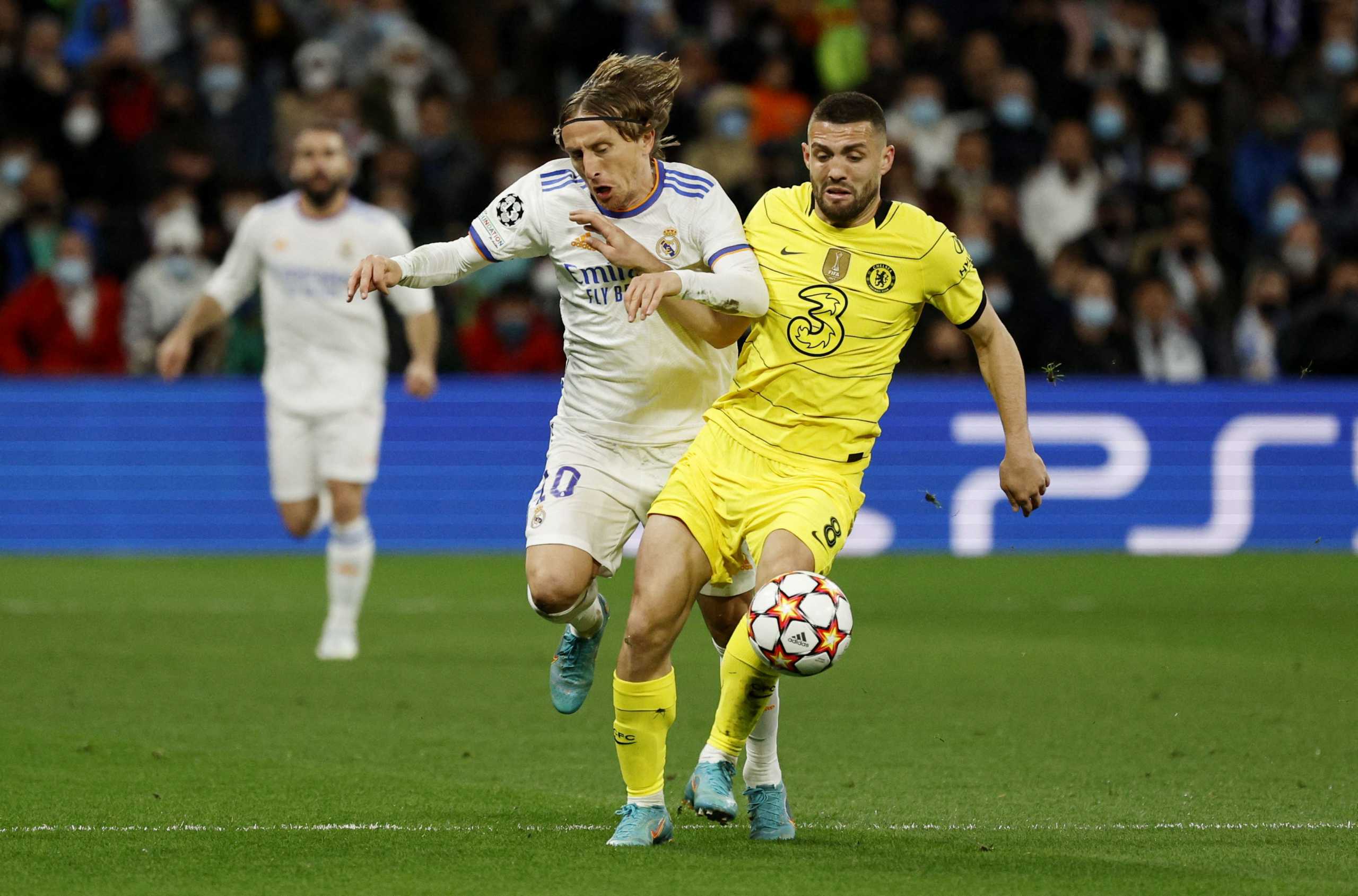 Soccer Football - Champions League - Quarter Final - Second Leg - Real Madrid v Chelsea - Santiago Bernabeu, Madrid, Spain - April 12, 2022 Real Madrid's Luka Modric in action with Chelsea's Mateo Kovacic REUTERS