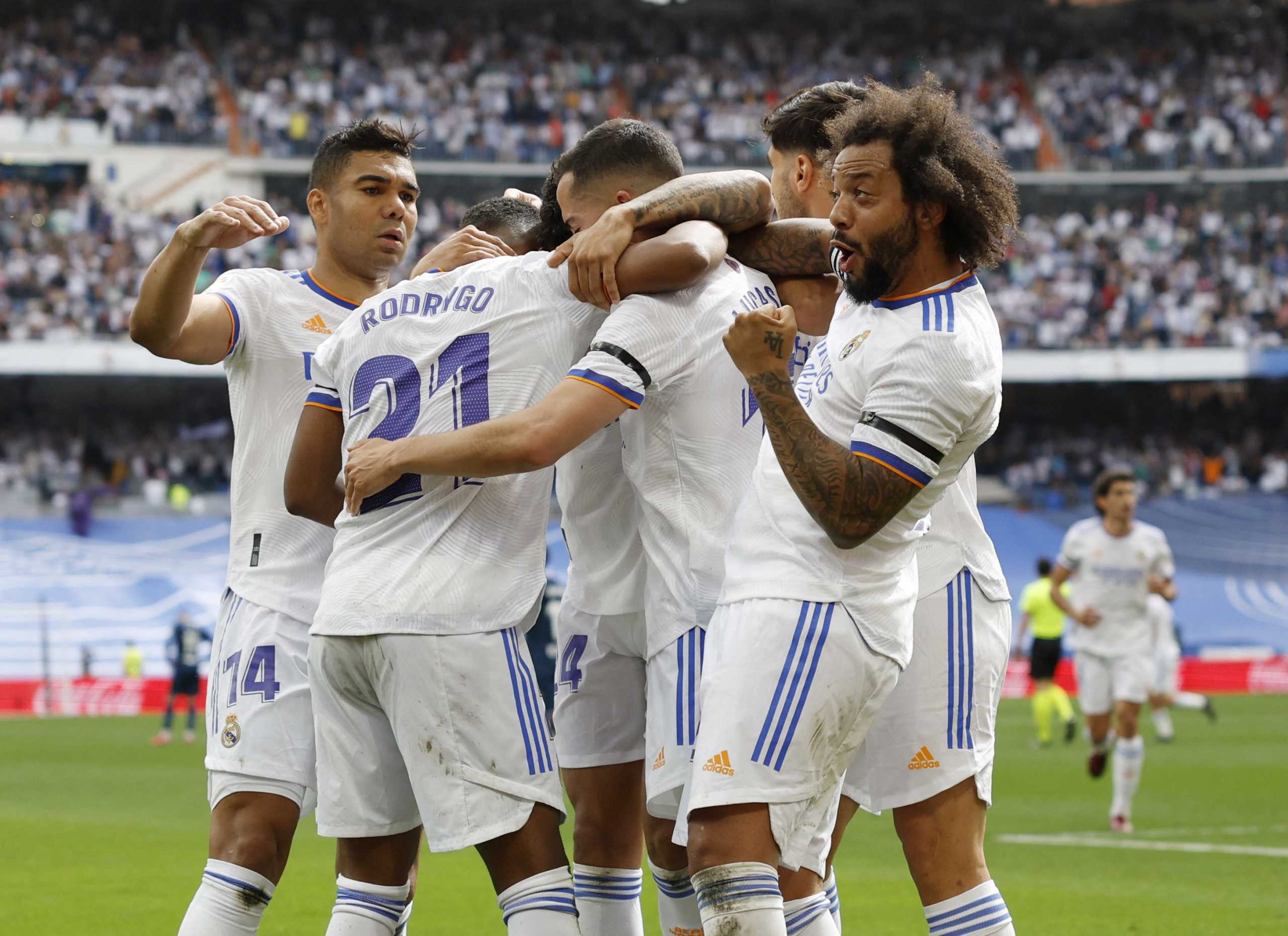 Soccer Football - LaLiga - Real Madrid v Espanyol - Santiago Bernabeu, Madrid, Spain - April 30, 2022 Real Madrid's Rodrygo celebrates scoring their second goal with Casemiro, Marcelo and teammates REUTERS