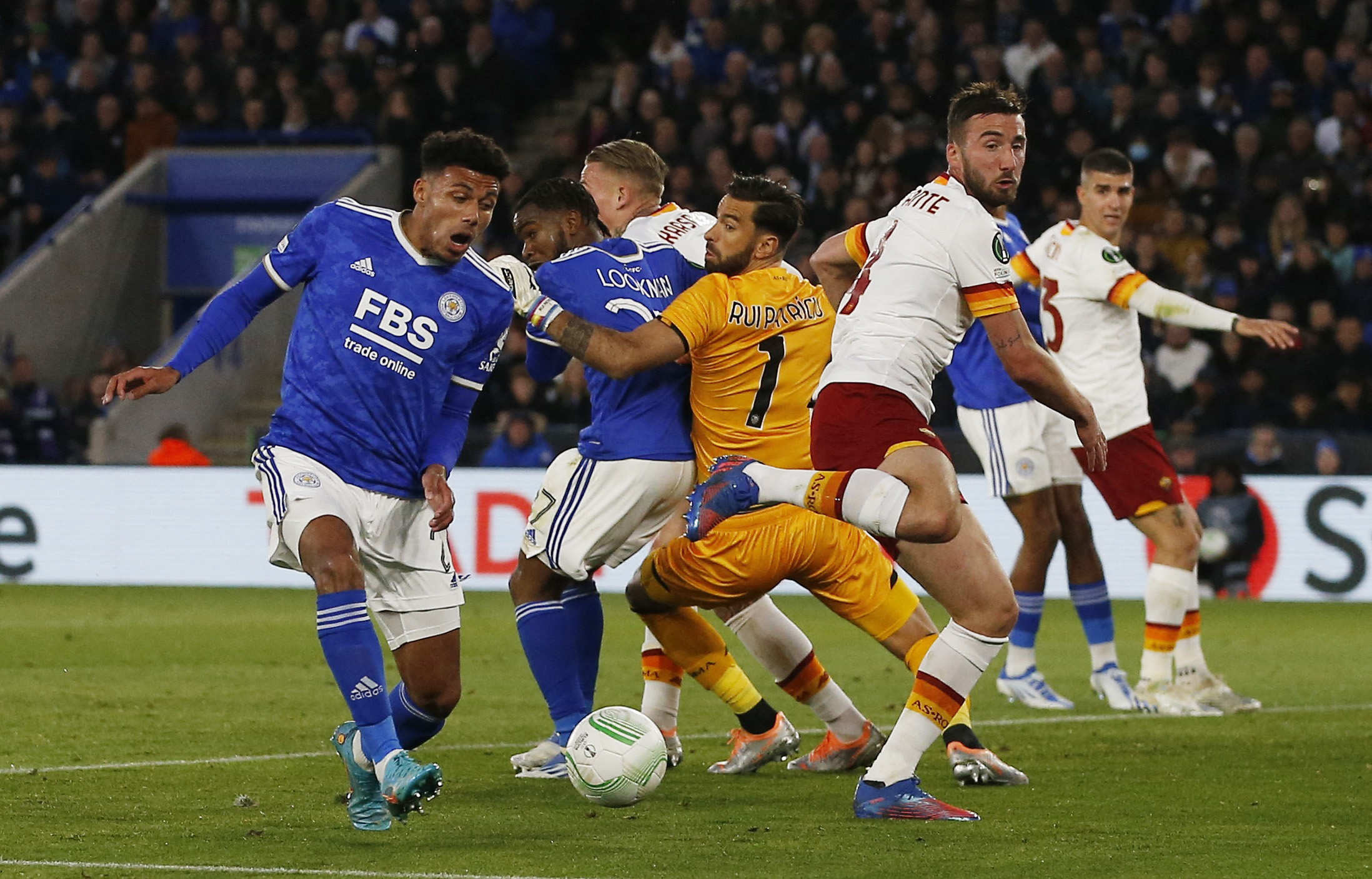 Soccer Football - Europa Conference League - Semi Final - First Leg - Leicester City v AS Roma - King Power Stadium, Leicester, Britain - April 28, 2022 Leicester City's James Justin in action with AS Roma's Bryan Cristante and Rui Patricio REUTERS