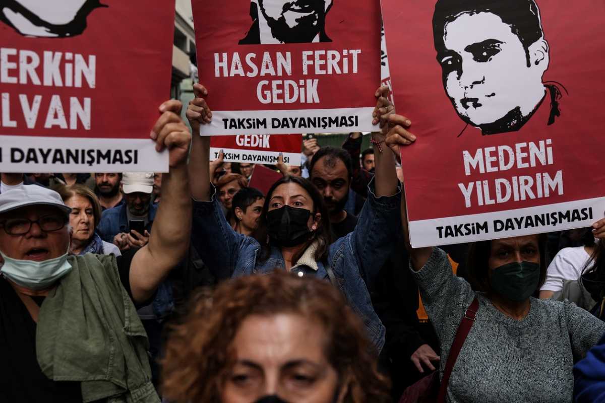 People take part in a protest against a Turkish court decision that sentenced philanthropist Osman Kavala to life in prison over trying to overthrow the government in Istanbul, Turkey, April 26, 2022. REUTERS