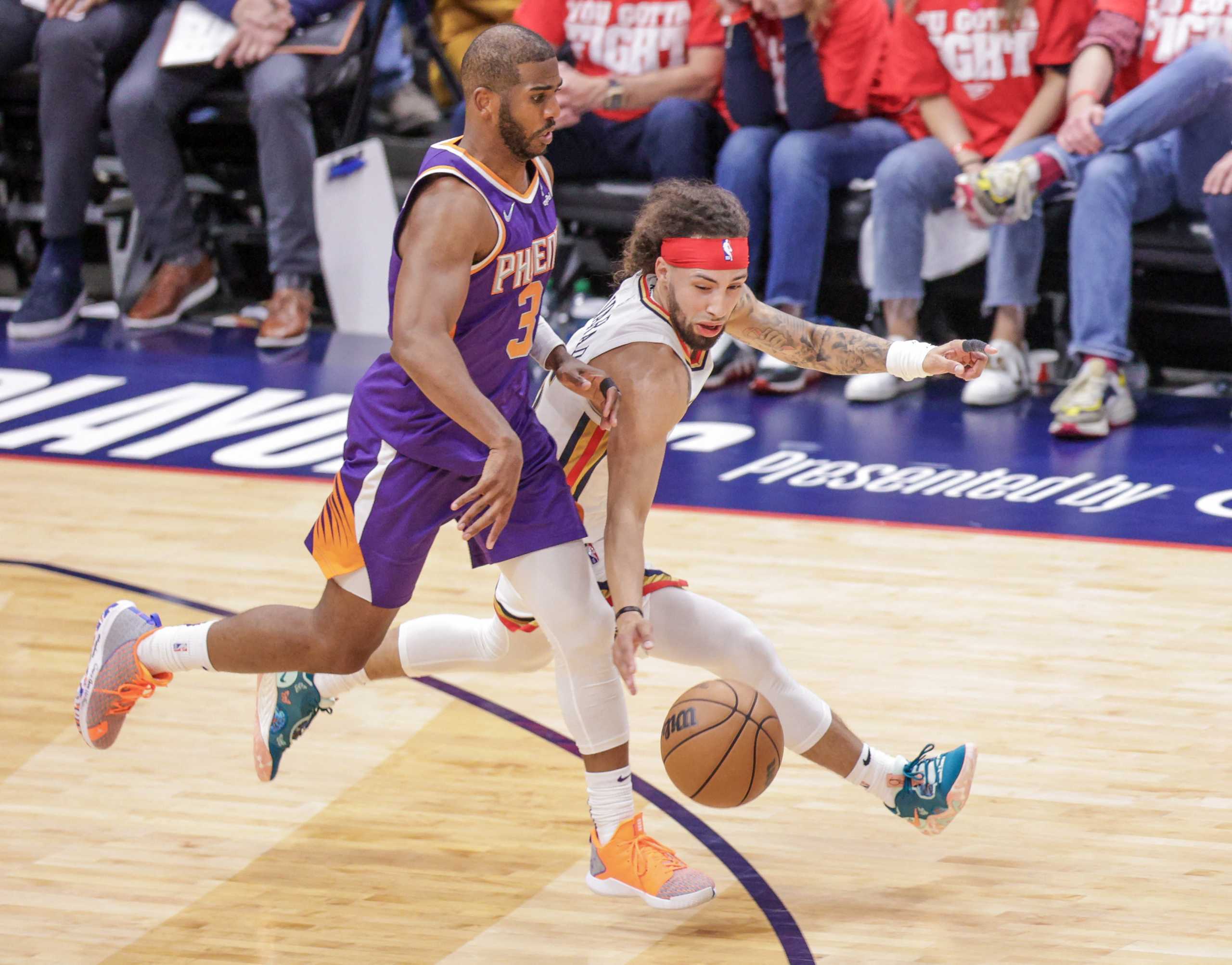 Apr 24, 2022; New Orleans, Louisiana, USA;  New Orleans Pelicans guard Jose Alvarado (15) steals the ball from Phoenix Suns guard Chris Paul (3) during the second half of game four of the first round of the 2022 NBA playoffs at Smoothie King Center. Mandatory Credit: Stephen Lew-USA TODAY Sports