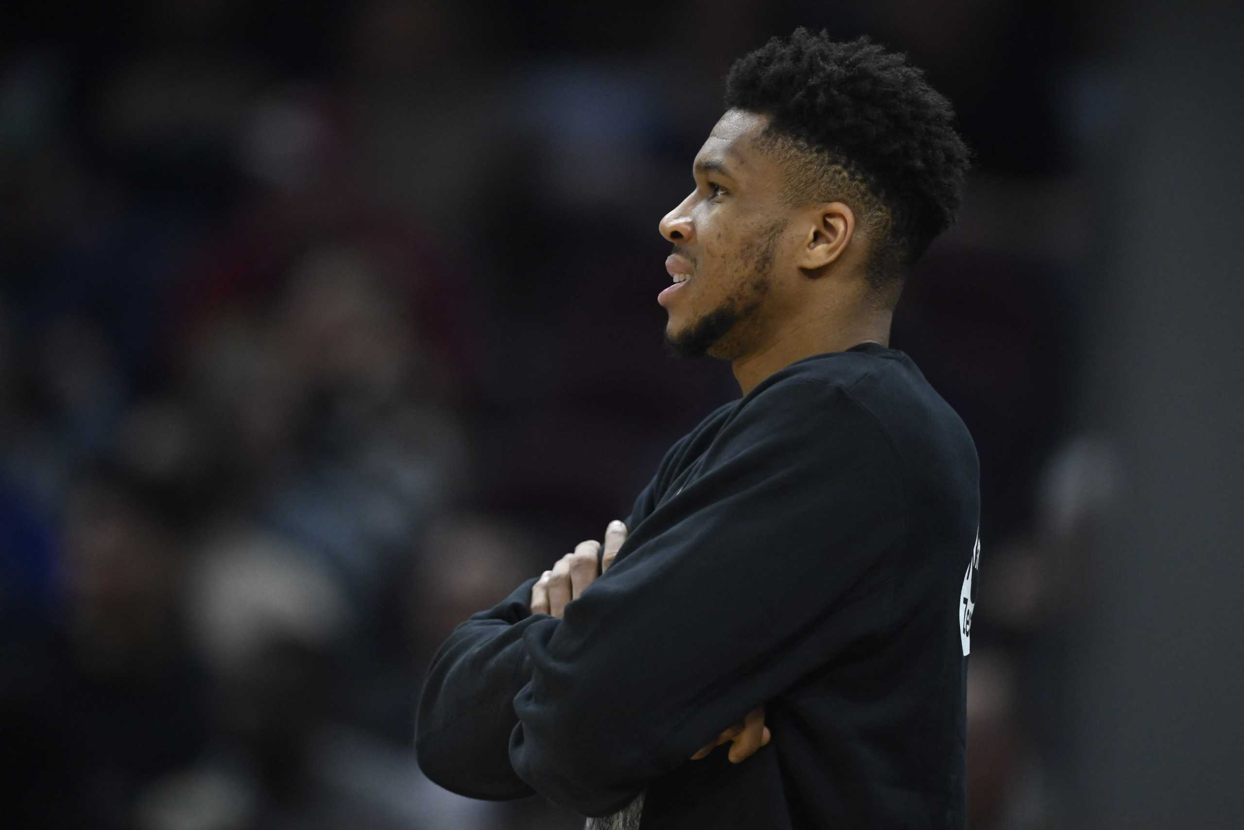 Apr 10, 2022; Cleveland, Ohio, USA; Milwaukee Bucks forward Giannis Antetokounmpo (34) watches the game in the second quarter against the Cleveland Cavaliers at Rocket Mortgage FieldHouse. Mandatory Credit: David Richard-USA TODAY Sports