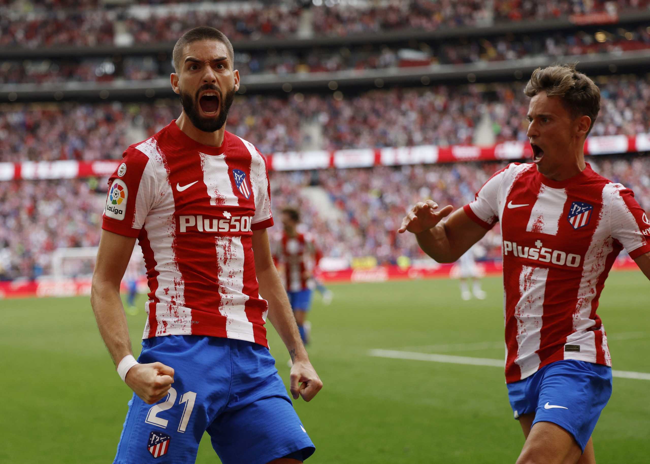 Soccer Football - LaLiga - Atletico Madrid v Espanyol - Wanda Metropolitano, Madrid, Spain - April 17, 2022 Atletico Madrid's Yannick Carrasco celebrates scoring their second goal with Marcos Llorente REUTERS