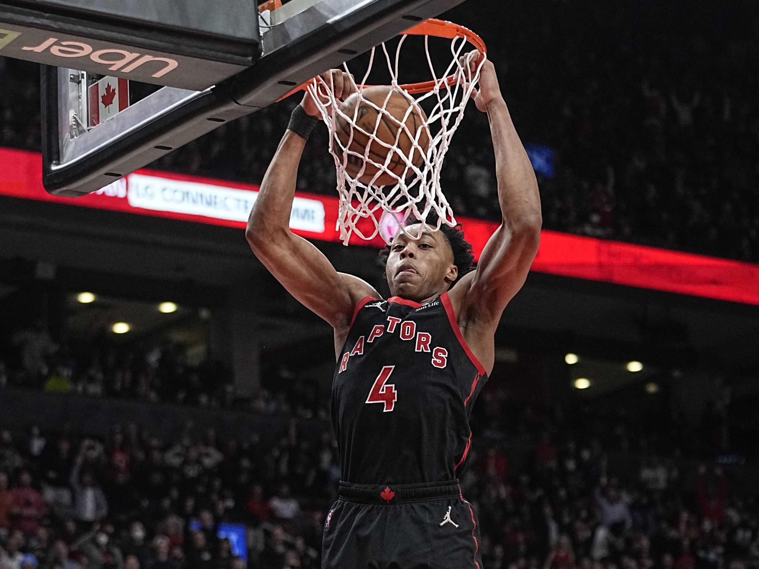 Apr 8, 2022; Toronto, Ontario, CAN; Toronto Raptors forward Scottie Barnes (4) dunks the ball against the Houston Rockets during the second half at Scotiabank Arena. Mandatory Credit: John E. Sokolowski-USA TODAY Sports