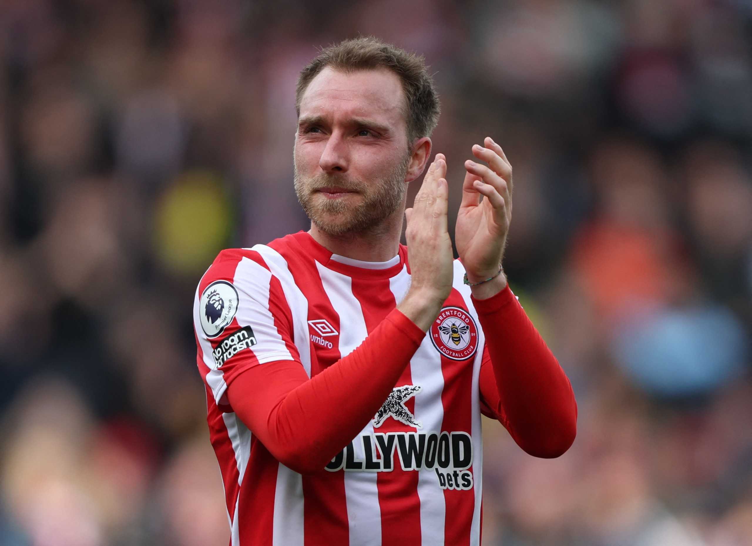 Soccer Football - Premier League - Brentford v West Ham United - Brentford Community Stadium, London, Britain - April 10, 2022 Brentford's Christian Eriksen applauds fans after the match REUTERS