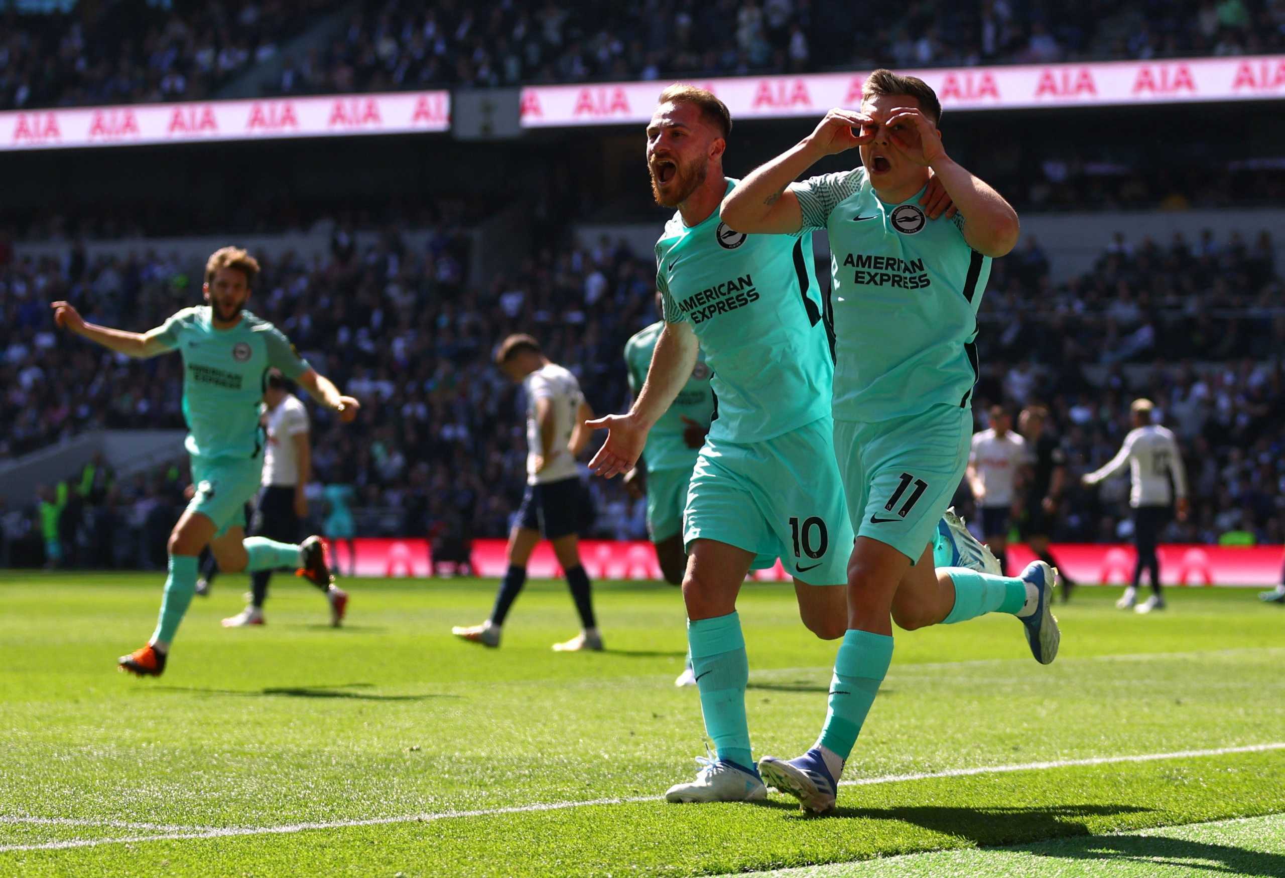 Soccer Football - Premier League - Tottenham Hotspur v Brighton & Hove Albion - Tottenham Hotspur Stadium, London, Britain - April 16, 2022 Brighton & Hove Albion's Leandro Trossard celebrates scoring their first goal with Alexis Mac Allister REUTERS