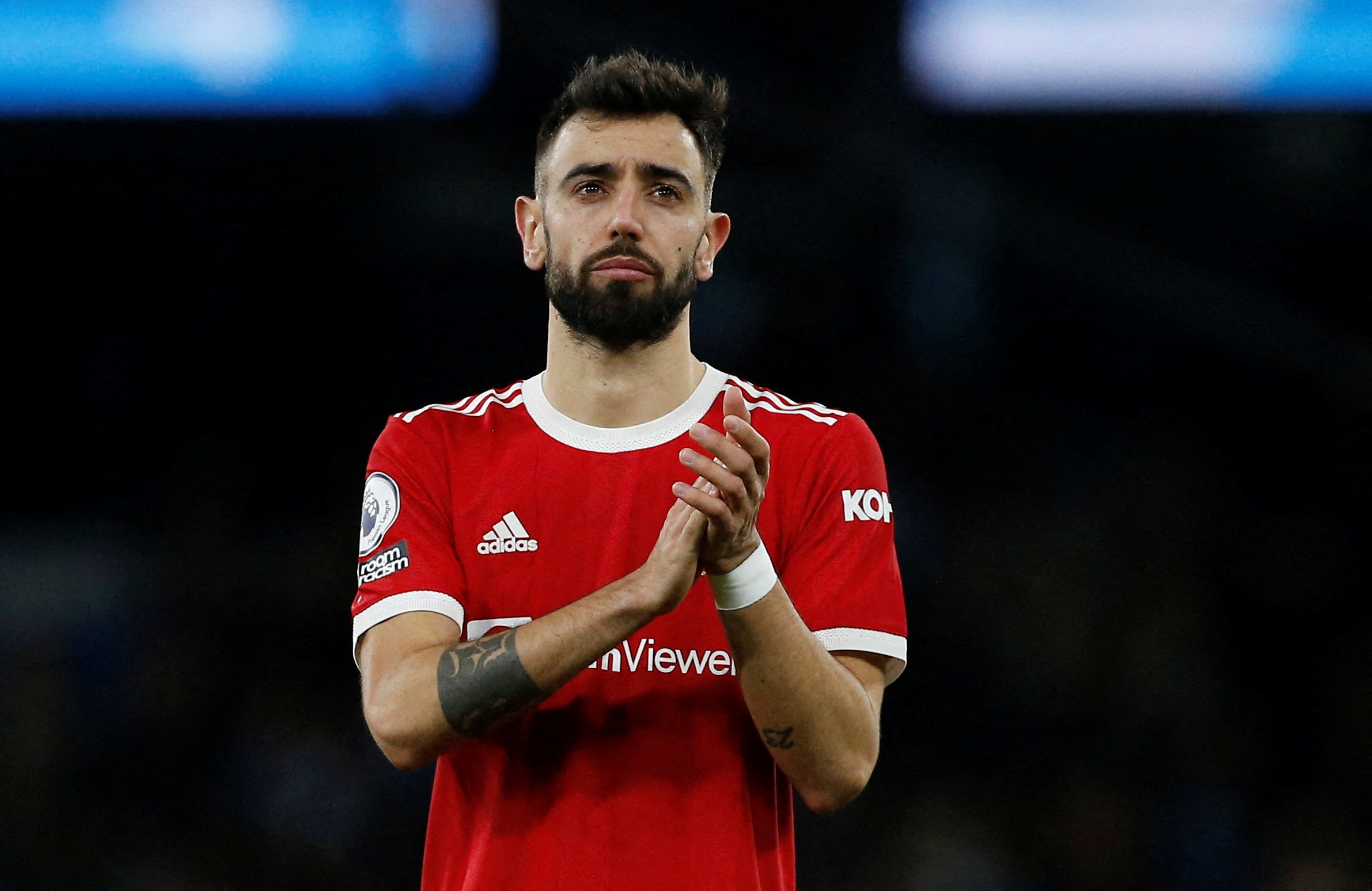 FILE PHOTO: Soccer Football - Premier League - Manchester City v Manchester United - Etihad Stadium, Manchester, Britain - March 6, 2022 Manchester United's Bruno Fernandes applauds fans after the match REUTERS