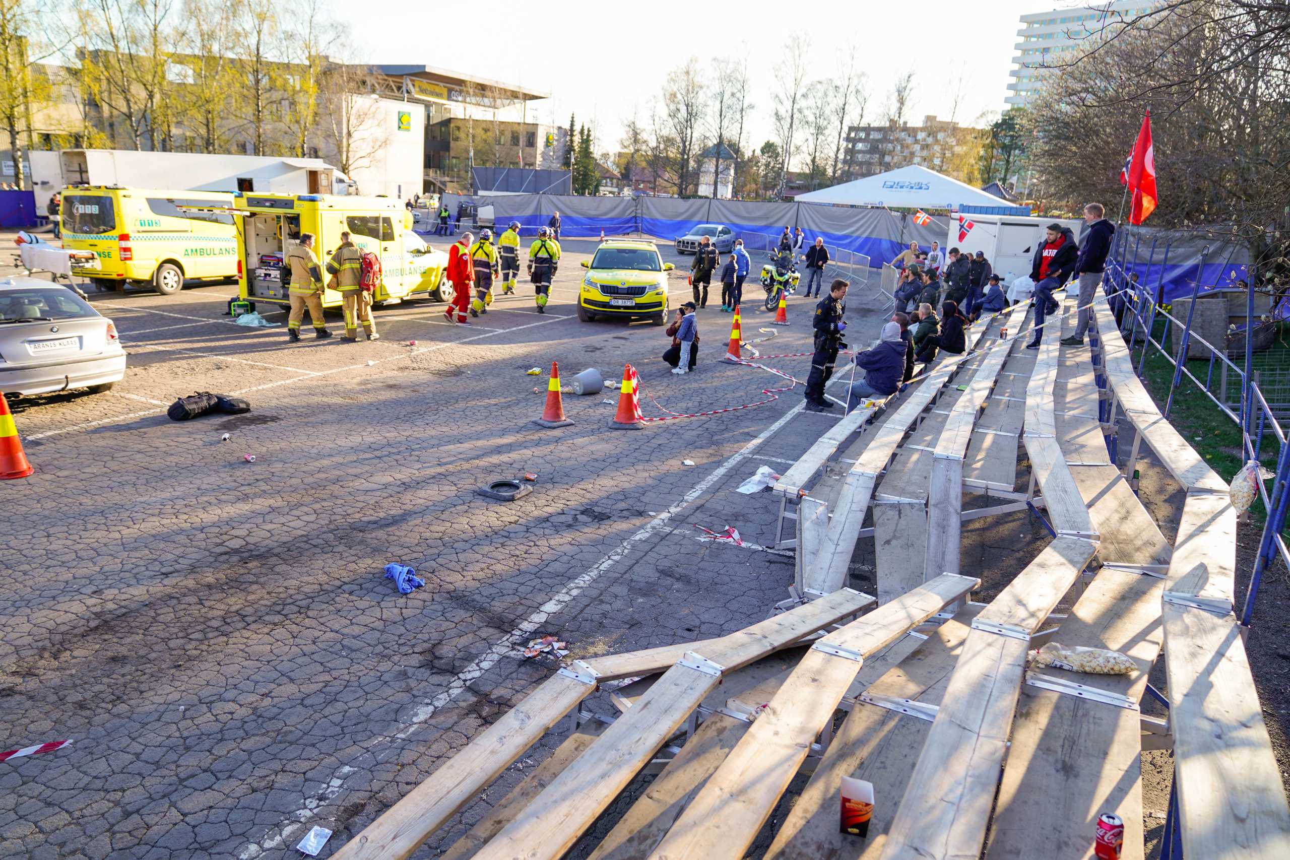 Emergency services work at a scene where a car drove into a grandstand during a motorshow, at Bjerkebanen in Oslo, Norway April 24, 2022. NTB