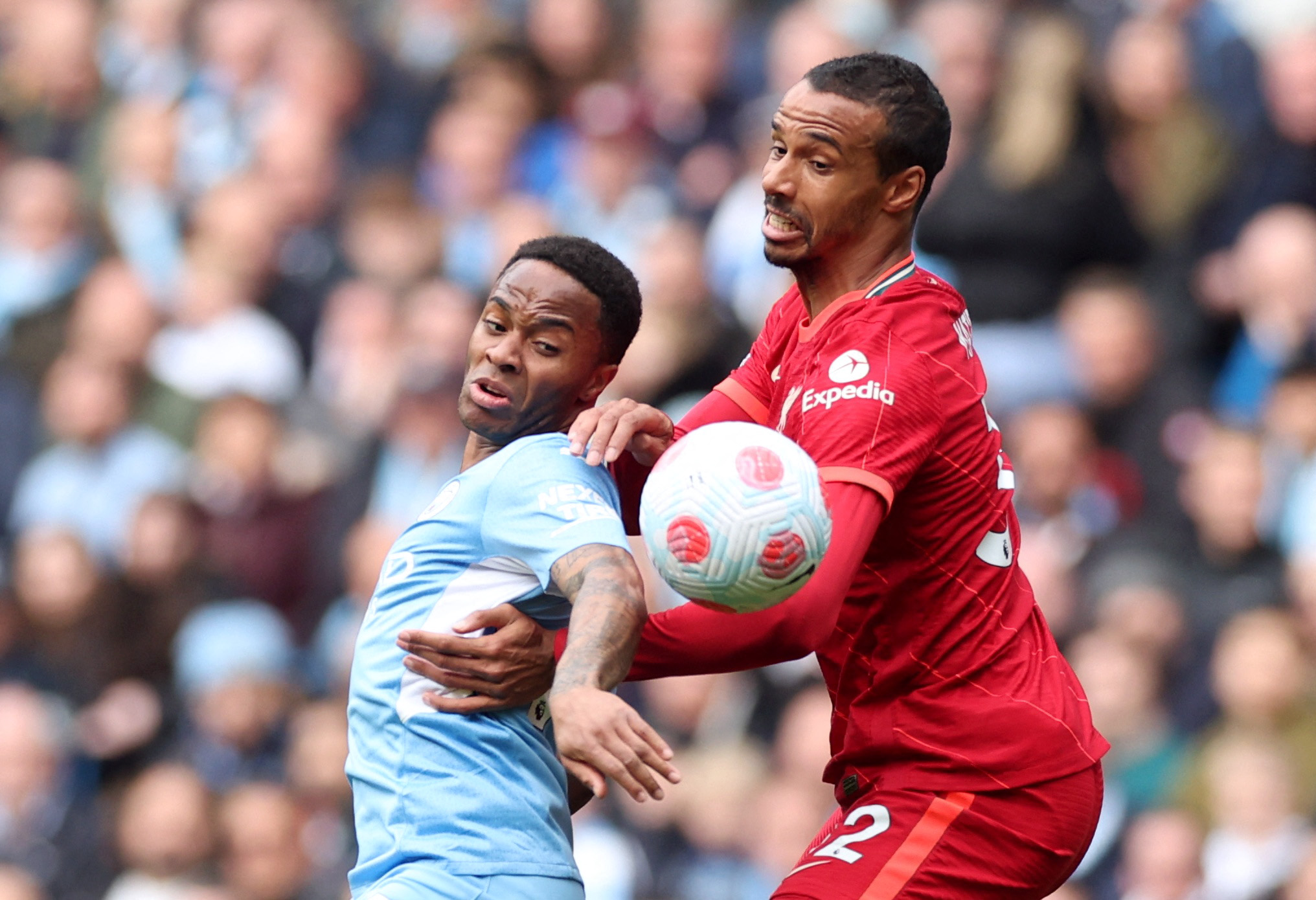 Soccer Football - Premier League - Manchester City v Liverpool - Etihad Stadium, Manchester, Britain - April 10, 2022 Manchester City's Raheem Sterling in action with Liverpool's Joel Matip Action Images via Reuters