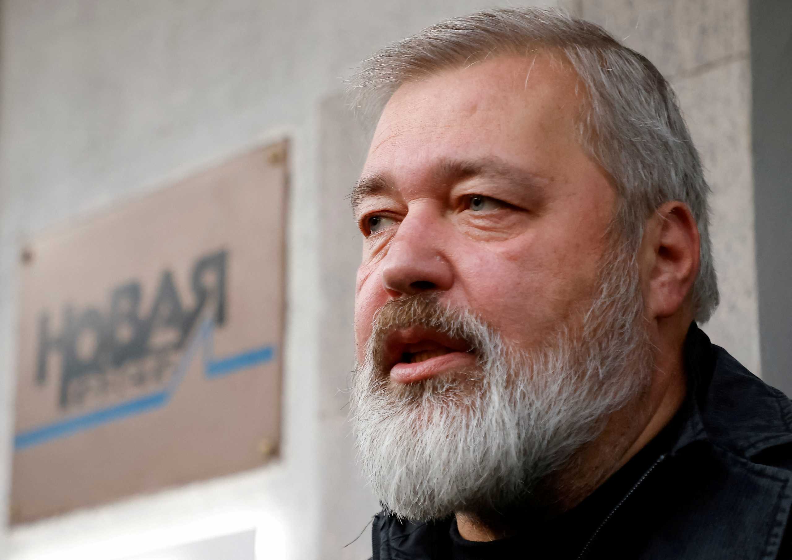 FILE PHOTO: Russian investigative newspaper Novaya Gazeta's editor-in-chief Dmitry Muratov, one of 2021 Nobel Peace Prize winners, speaks with journalists in Moscow, Russia October 8, 2021.  REUTERS