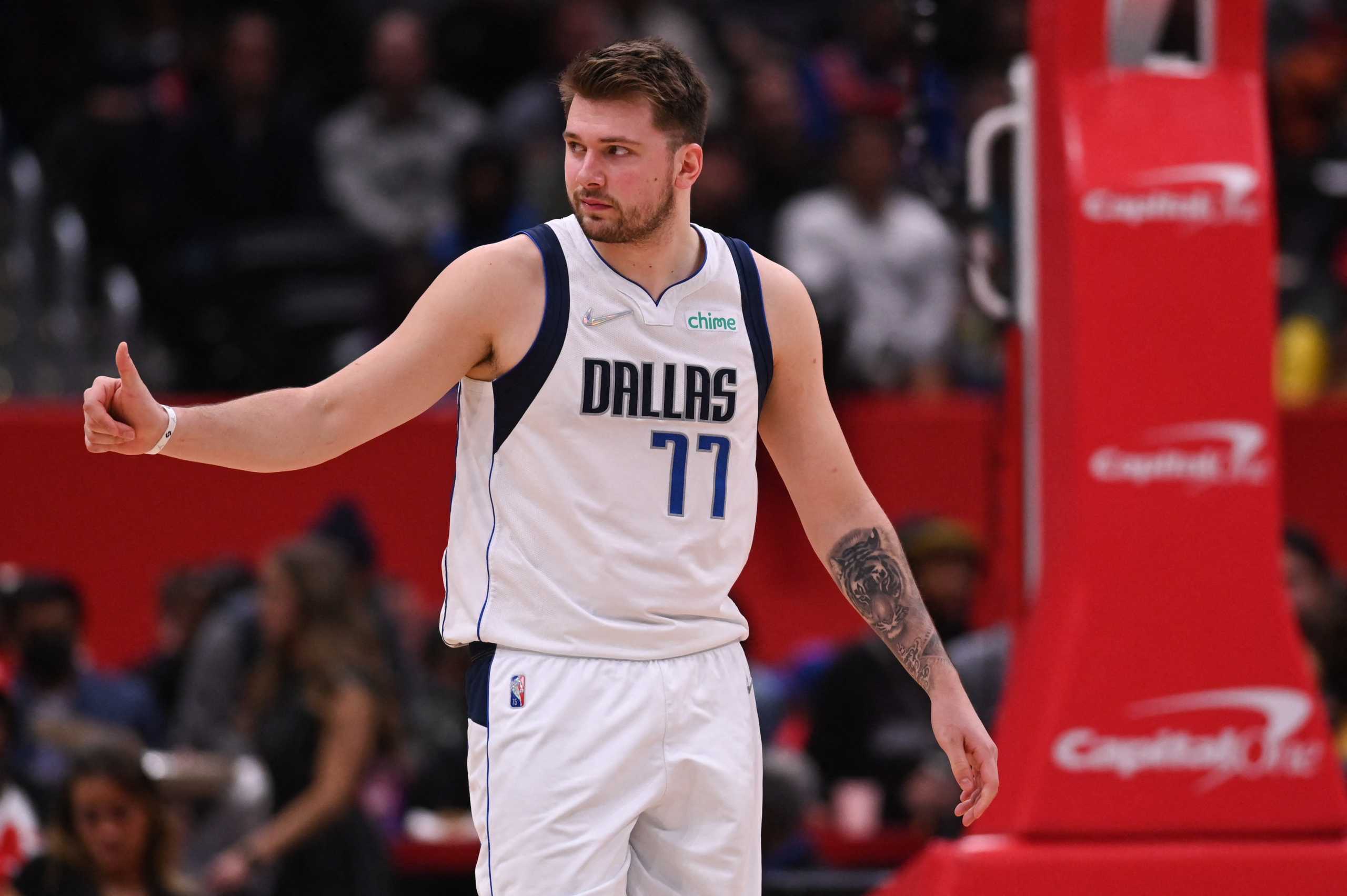 Apr 1, 2022; Washington, District of Columbia, USA; Dallas Mavericks guard Luka Doncic (77) signals to the fans during the first half H| at Capital One Arena. Mandatory Credit: Tommy Gilligan-USA TODAY Sports