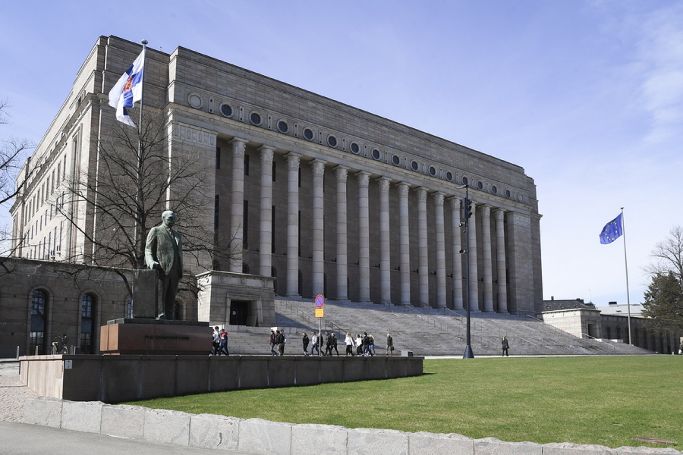 epa07557930 A general view of Finland's national flag (L) and the EU flag (R) in front of the Finnish parliament building during the Europe Day celebrations in Finnish capital Helsinki, Finland, 09 May 2019. The Europe Day event was co-organized by the Finnish Foreign Ministry, Finnish Broadcasting Corporation YLE, European Movement Finland, Young European Federalists Europe, and European Commission as well as the  European Parliament. The Europe Day has been celebrated 09 May since 1985 and comes ahead of the European Parliament elections, to be held between 23 and 26 May 2019.  EPA