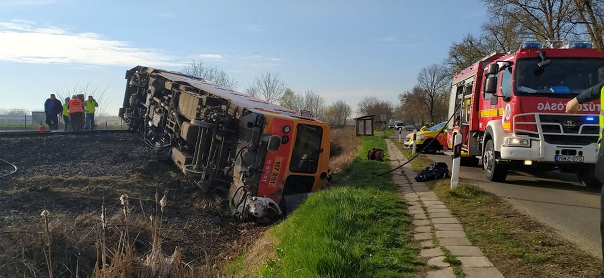 A derailed train is seen at a scene of an accident where a pick-up truck crashed into a train in Mindszent, Hungary, April 5, 2022. Police.hu