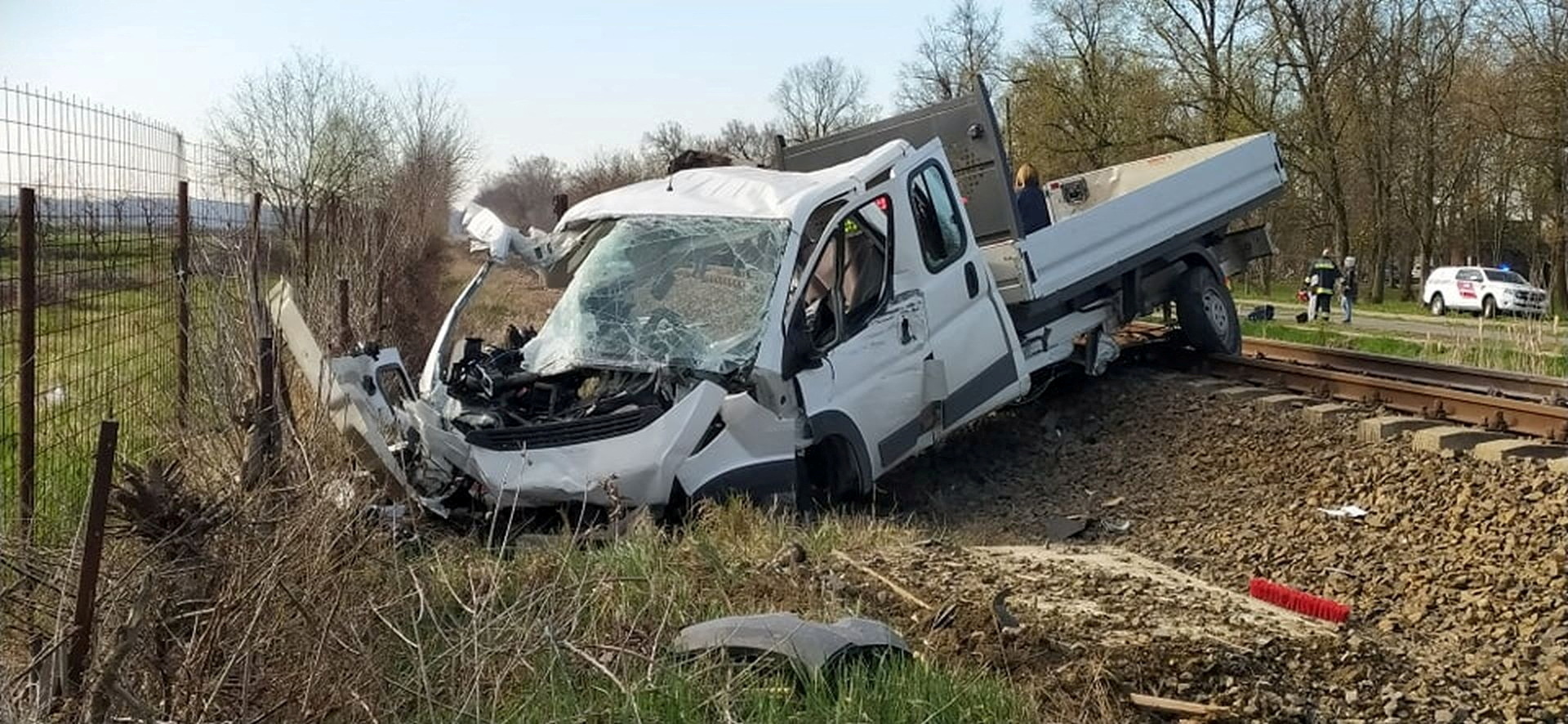 A damaged pick-up truck is seen at a scene of an accident where it crashed into a train in Mindszent, Hungary, April 5, 2022. Police.hu
