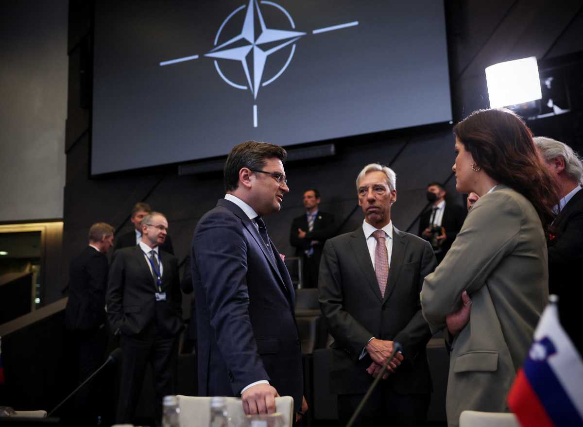 Ukrainian Foreign Minister Dmytro Kuleba, Portuguese Foreign Minister Joao Gomes Cravinho and Iceland's Foreign Minister Thordis Kolbrun R. Gylfadottir attend a NATO foreign ministers meeting, amid Russia's invasion of Ukraine, at NATO headquarters in Brussels, Belgium April 7, 2022. REUTERS